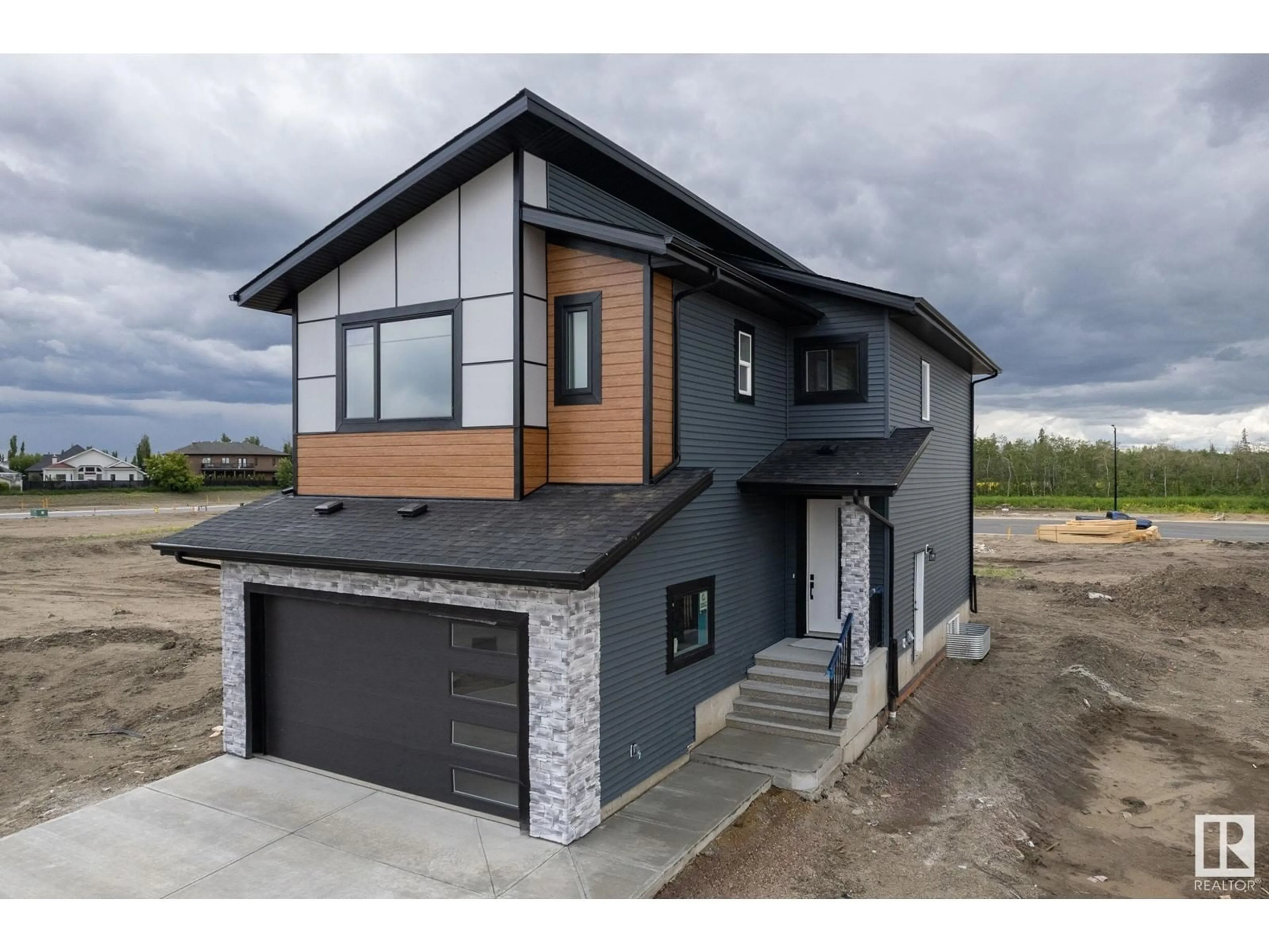 Frontside or backside of a home for 16532 3 ST NE, Edmonton Alberta T5Y4J2