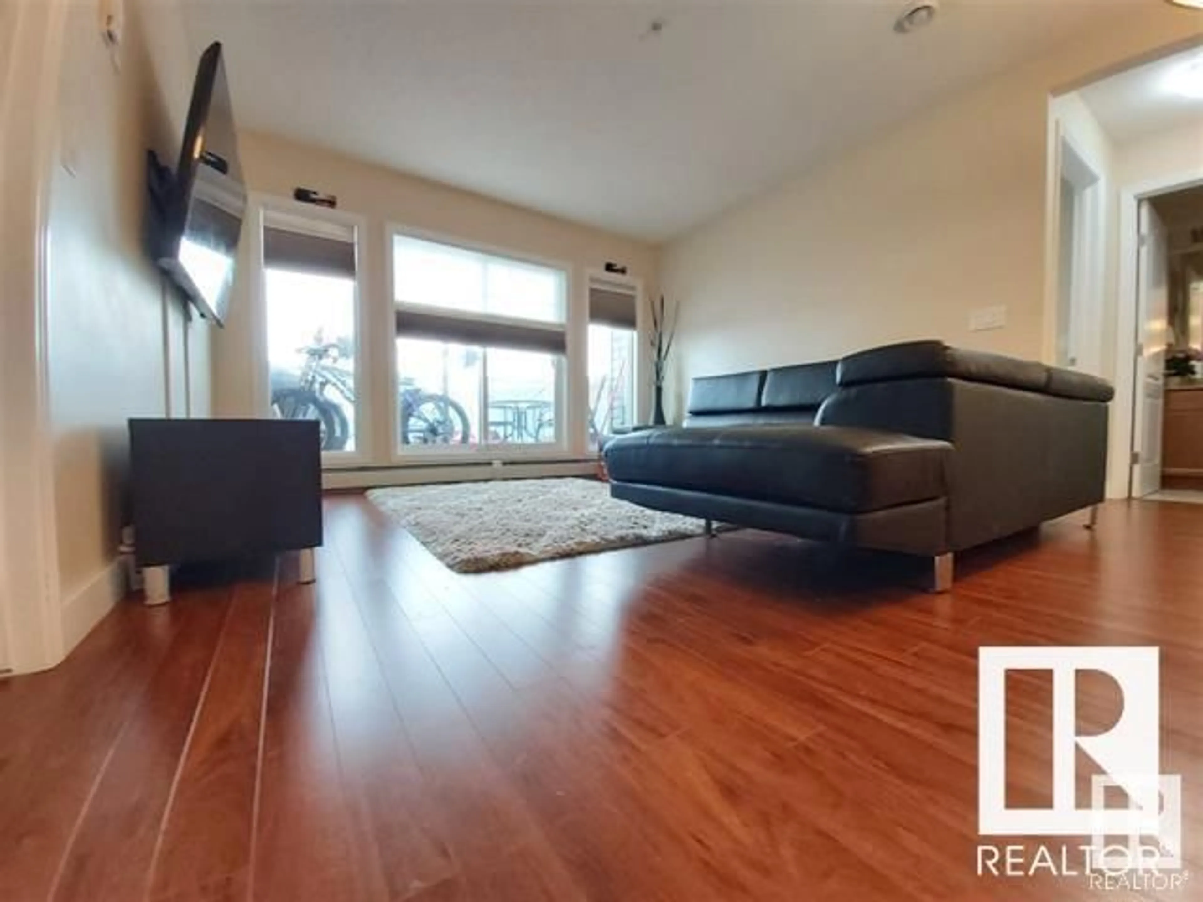 Living room for #113 12660 142 AV NW, Edmonton Alberta T5X0J5