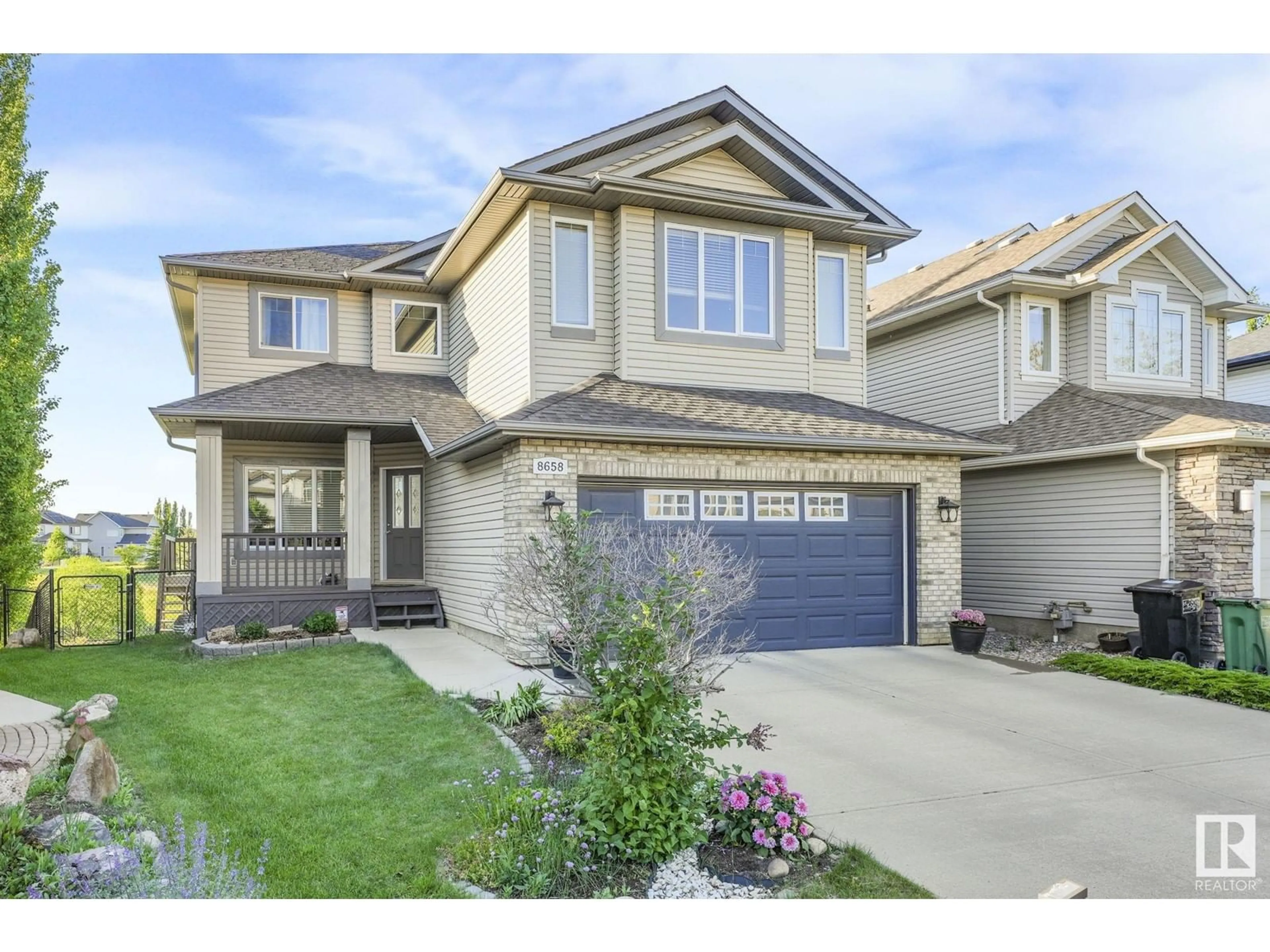 Frontside or backside of a home for 8658 SLOANE CO NW, Edmonton Alberta T6R0K9