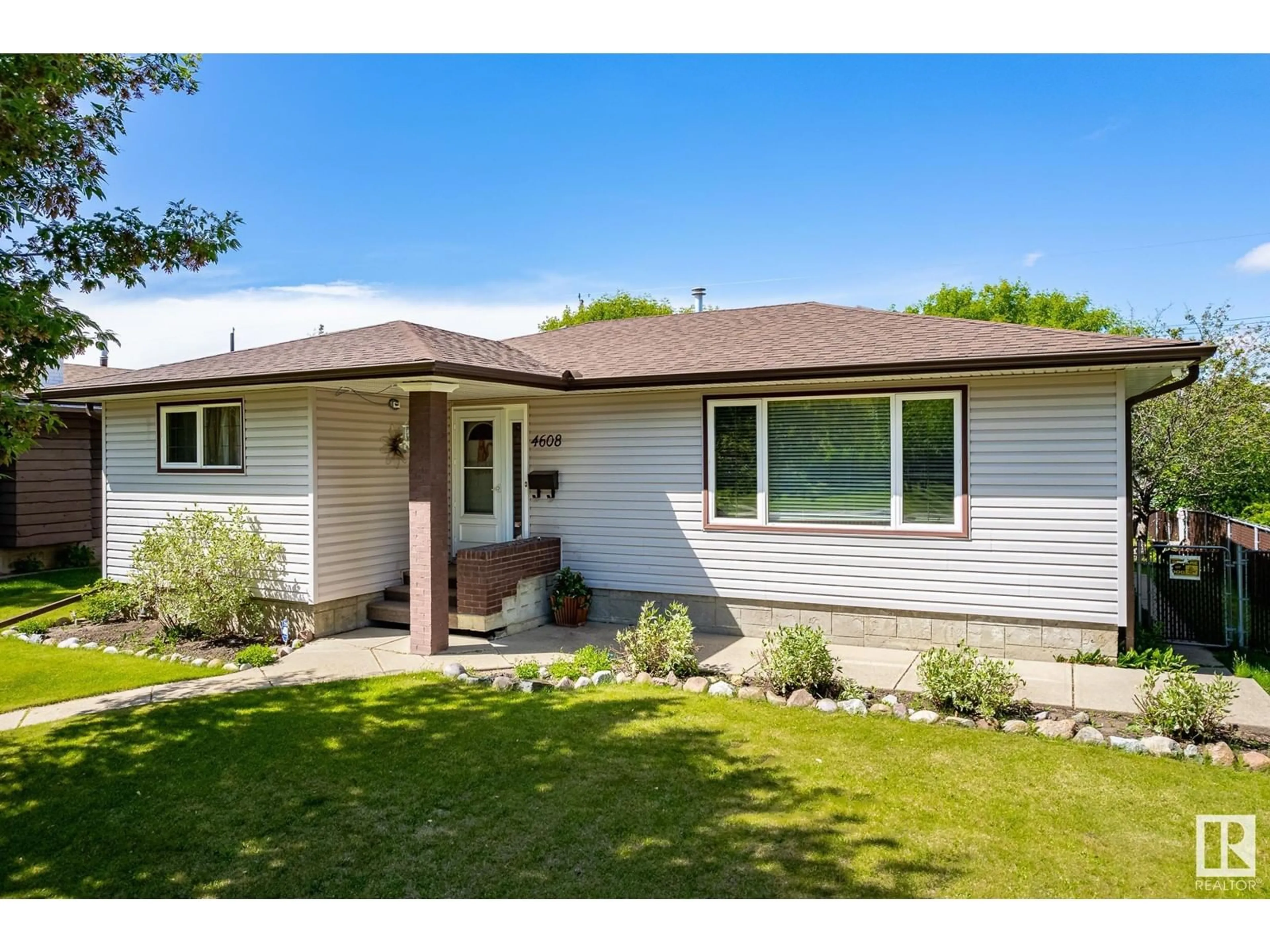 Frontside or backside of a home for 4608 109 AV NW, Edmonton Alberta T6A1R6