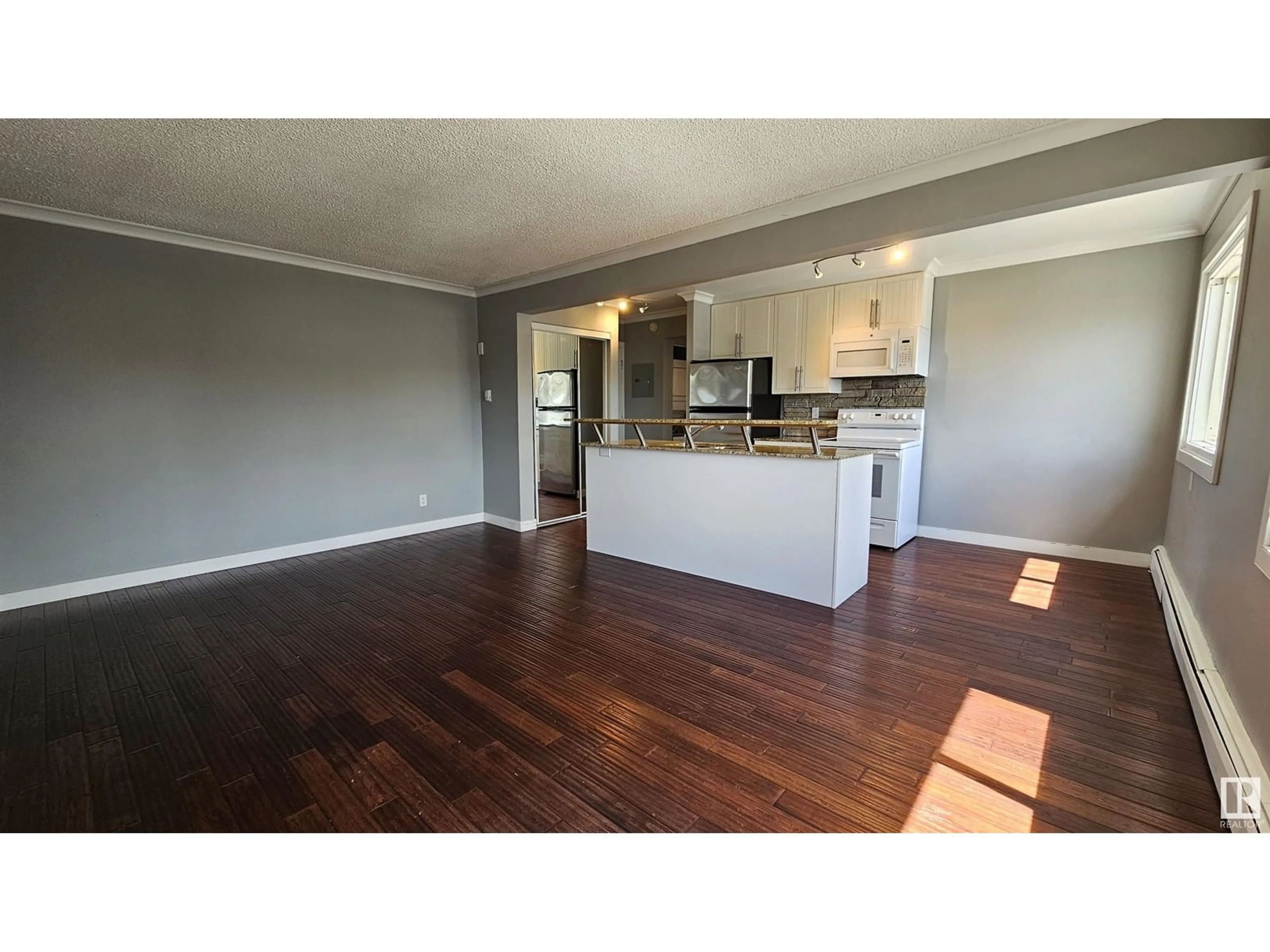 Open concept kitchen for #34 10525 83 AV NW, Edmonton Alberta T6E2E1