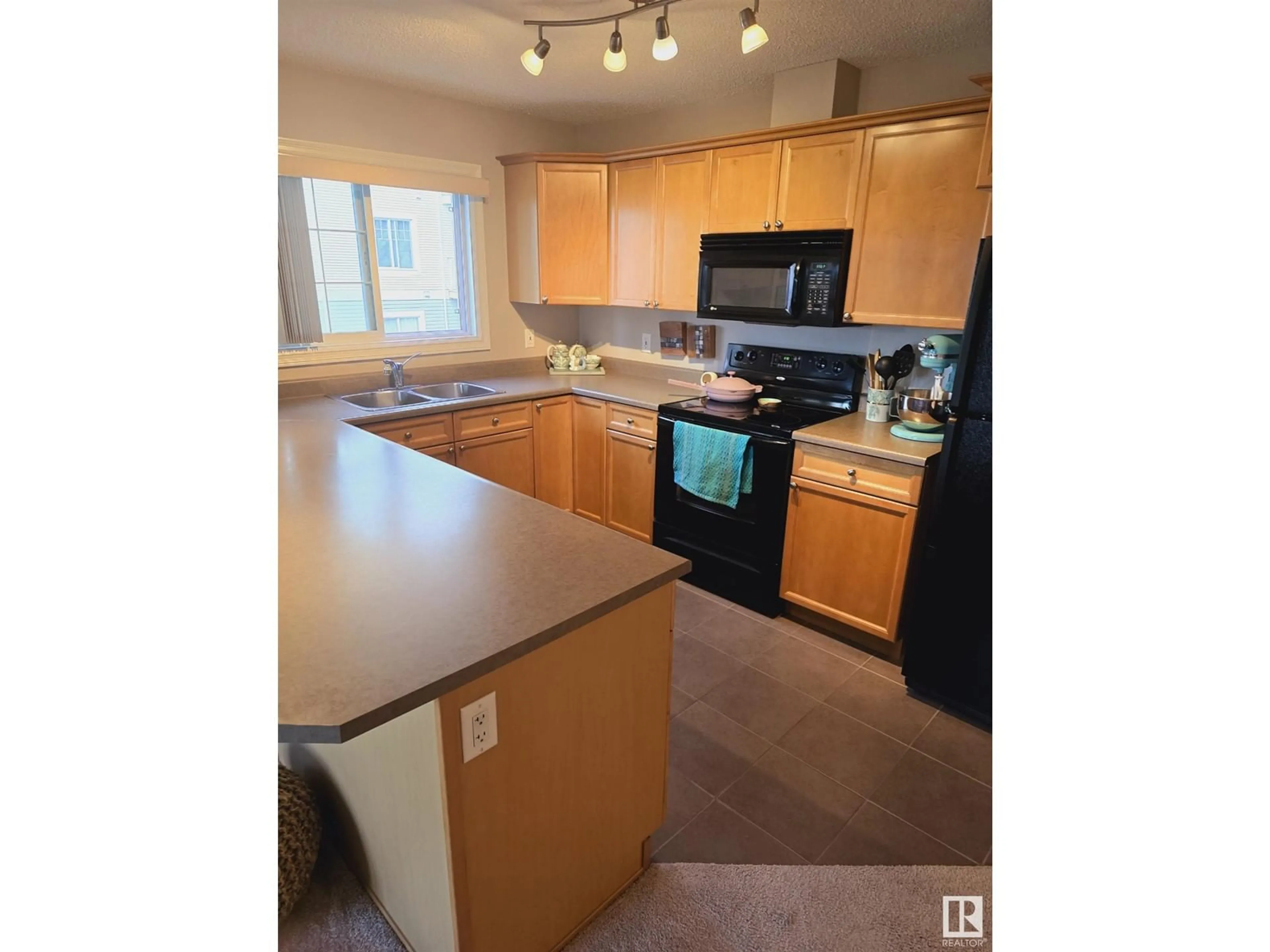 Standard kitchen for #215 4403 23 ST NW NW, Edmonton Alberta T6T0E4