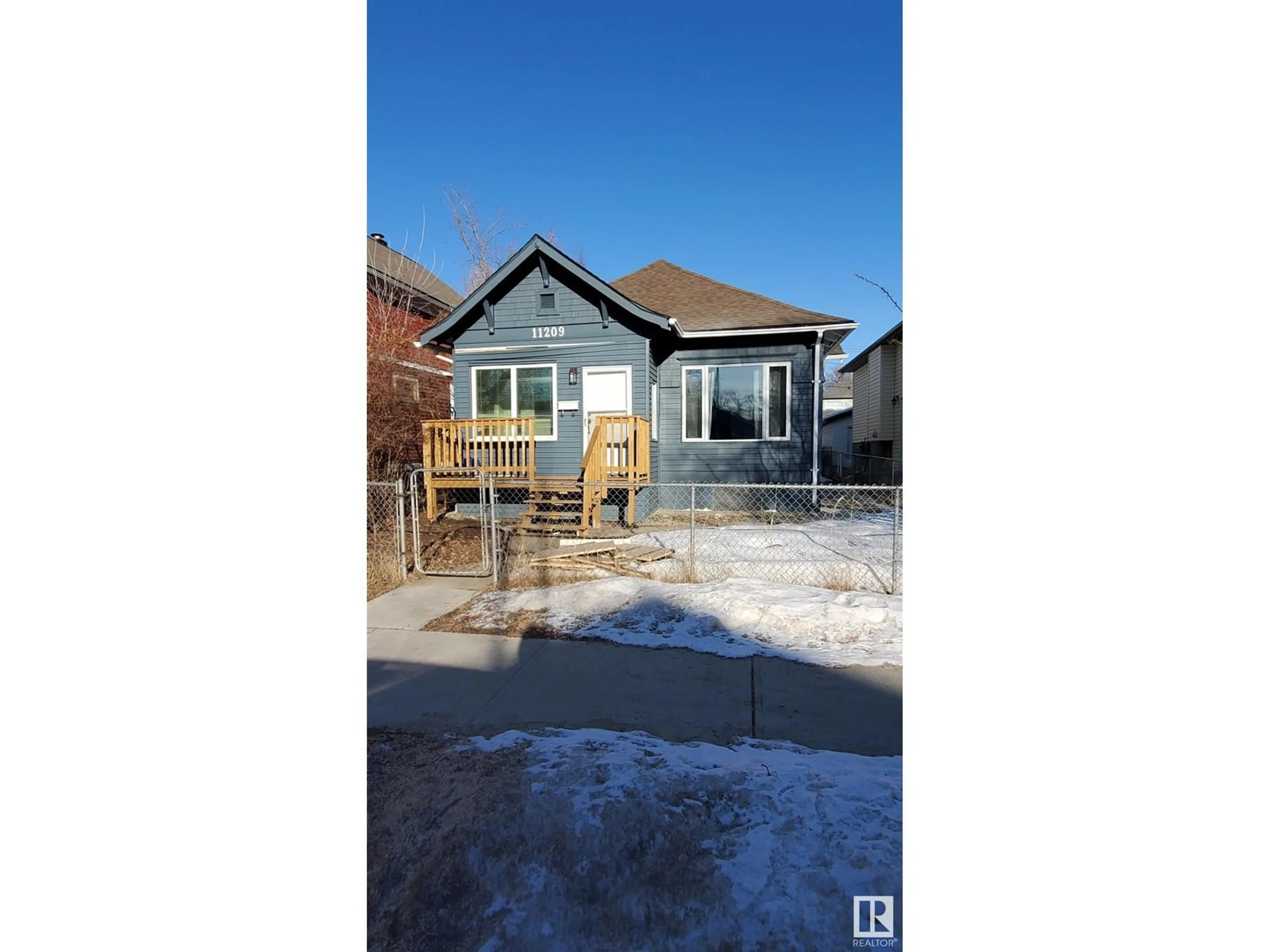 Frontside or backside of a home for 11209 96 ST NW, Edmonton Alberta T5G1G1