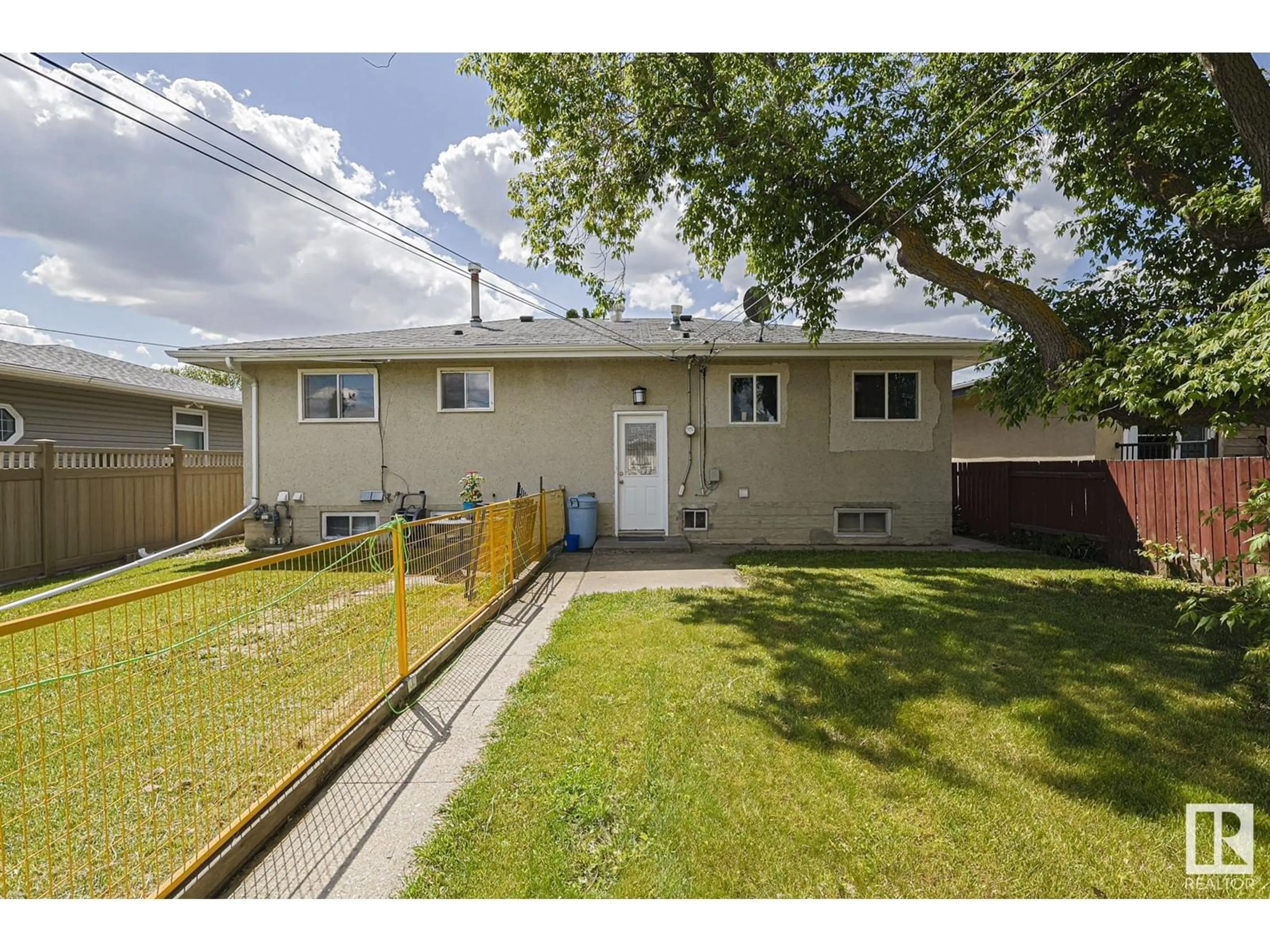 Frontside or backside of a home for 7708 132 AV NW, Edmonton Alberta T5C2B1