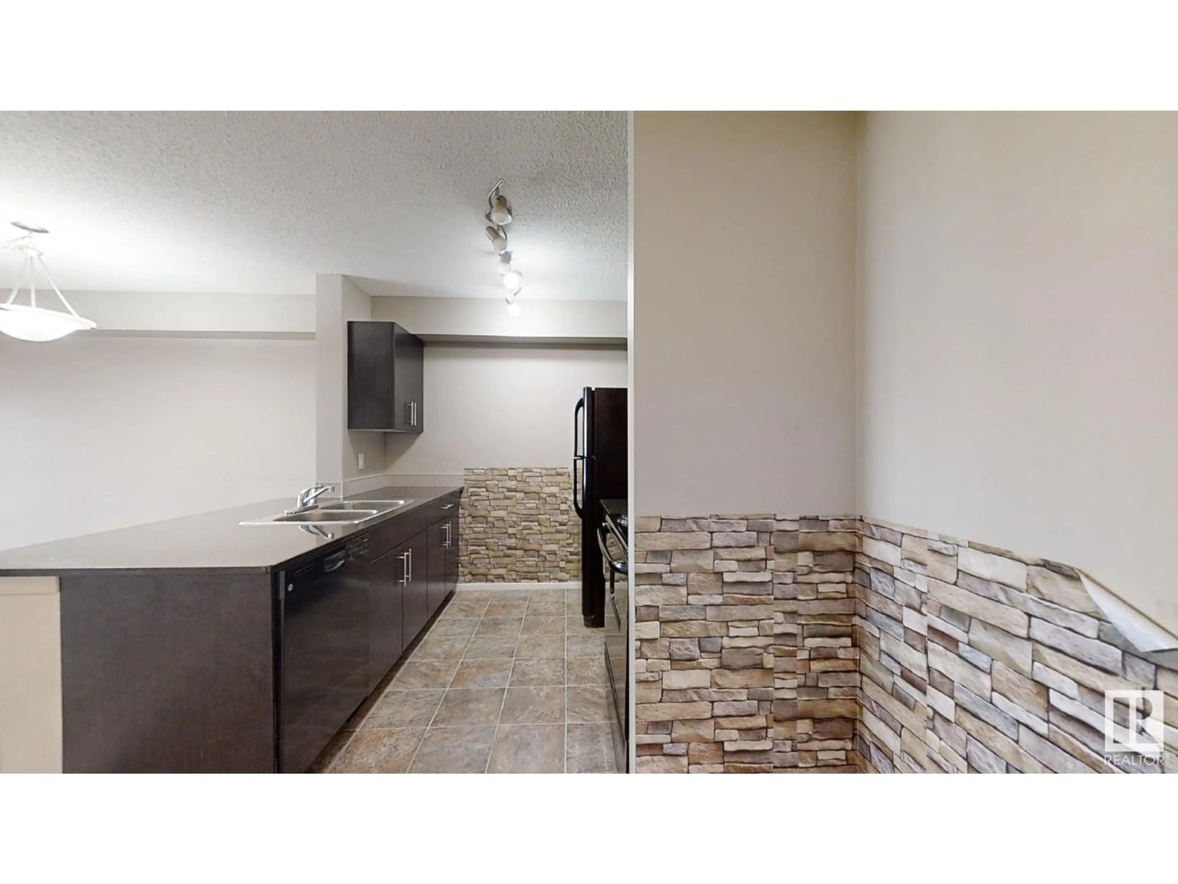 Open concept kitchen for #404 1510 WATT DR SW, Edmonton Alberta T6X2E5