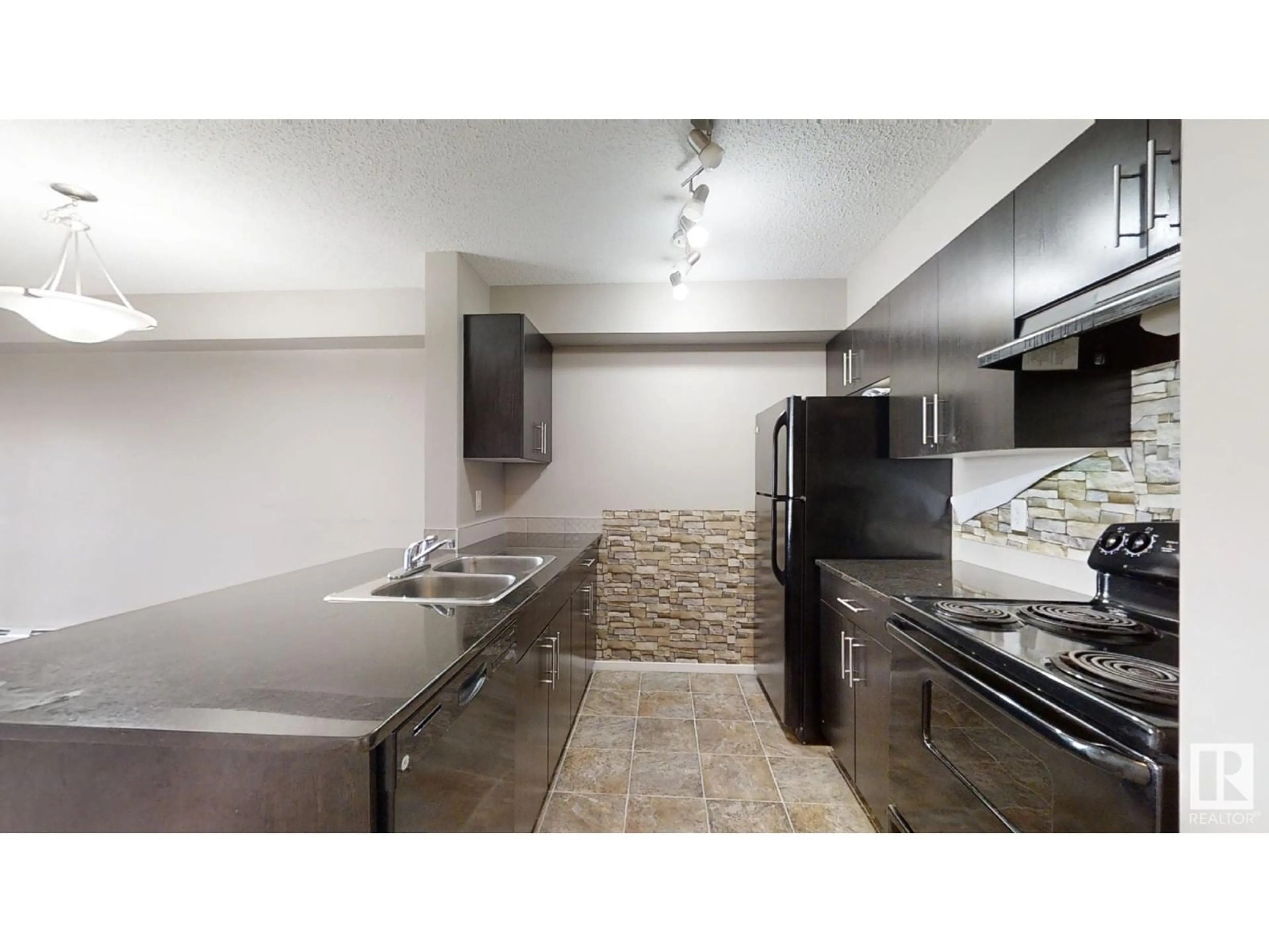 Standard kitchen, ceramic floors for #404 1510 WATT DR SW, Edmonton Alberta T6X2E5