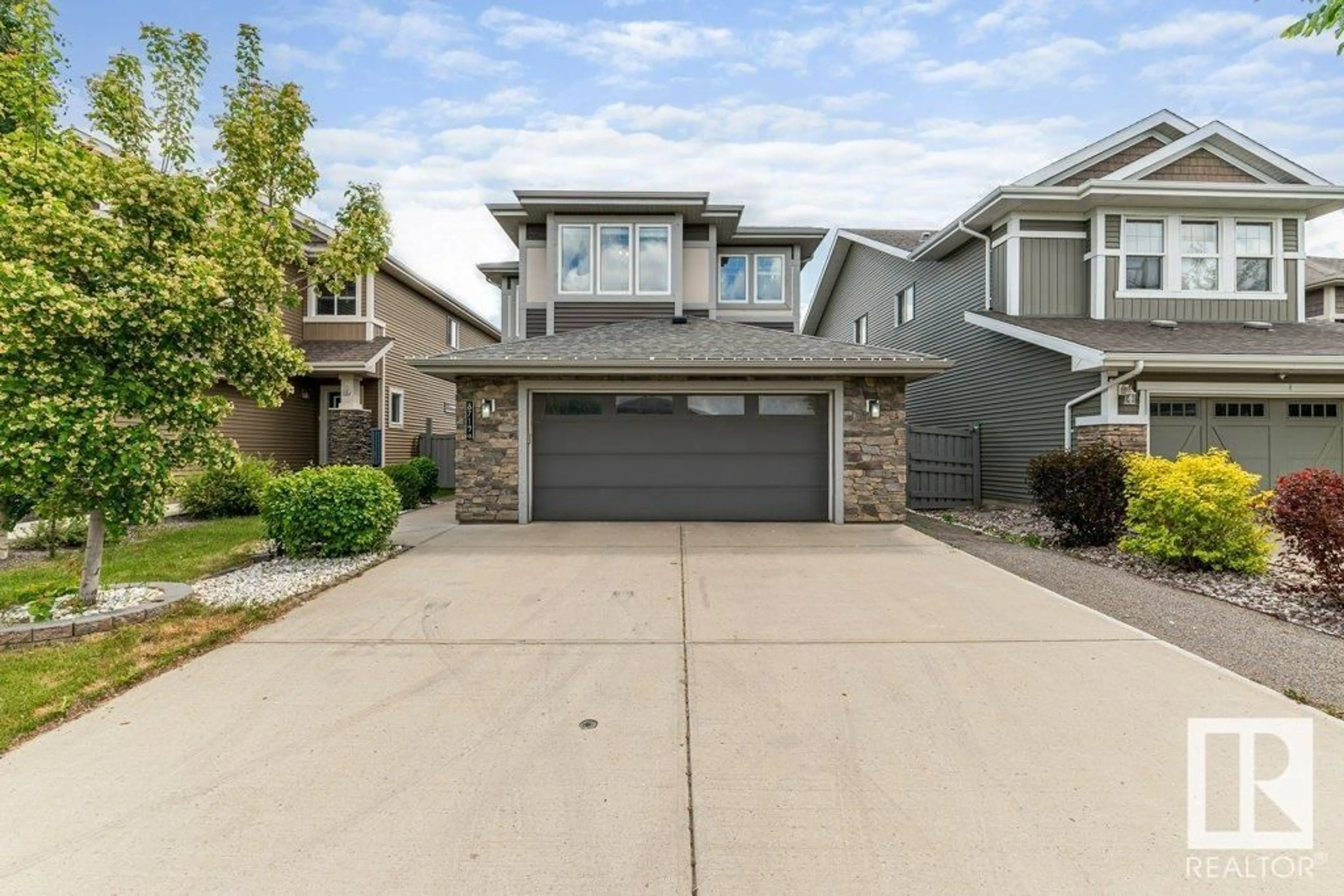 Frontside or backside of a home for 8719 218 ST NW, Edmonton Alberta T5T4R7