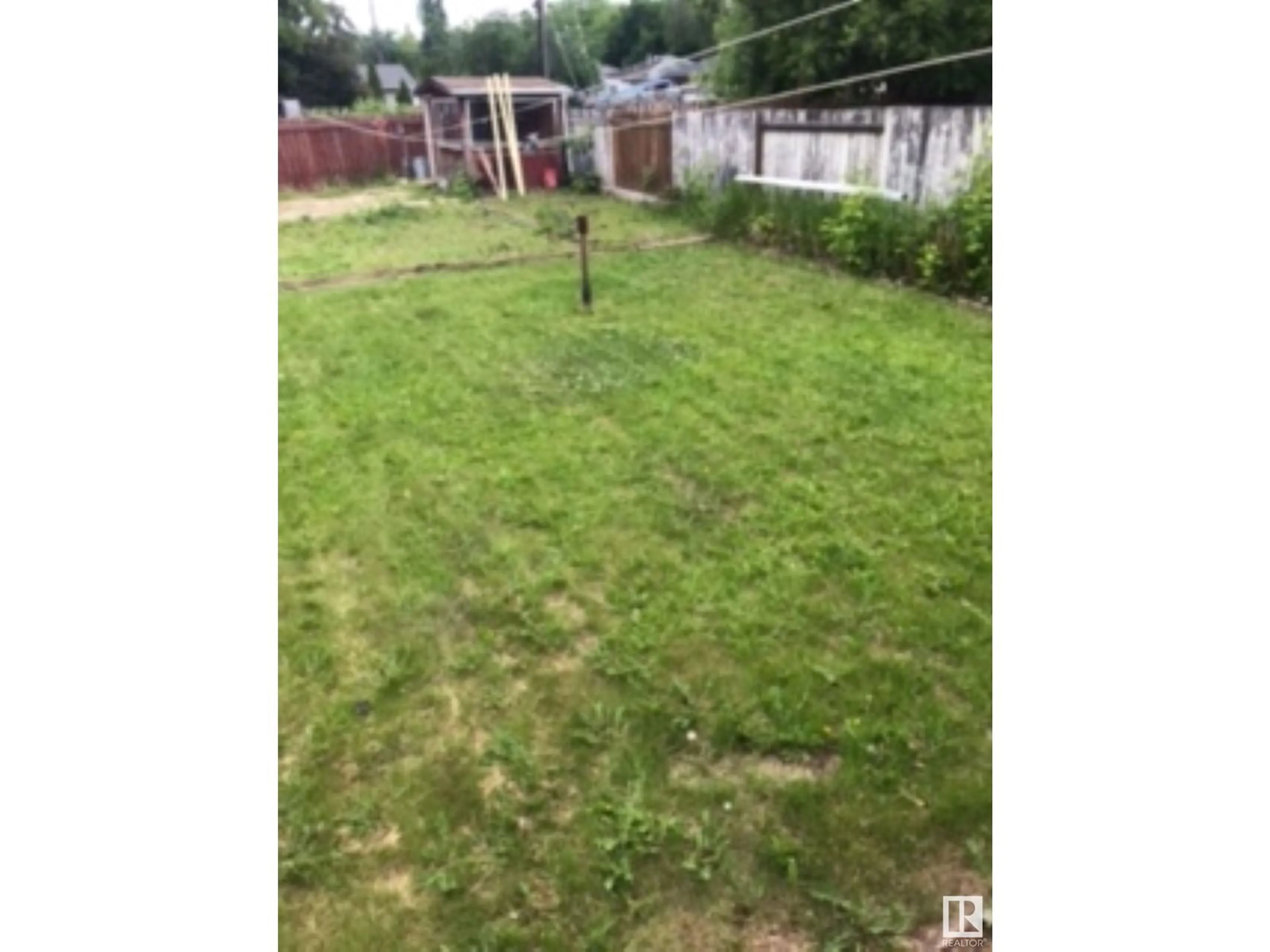 Fenced yard for 6408 106 ST NW, Edmonton Alberta T6H2V4