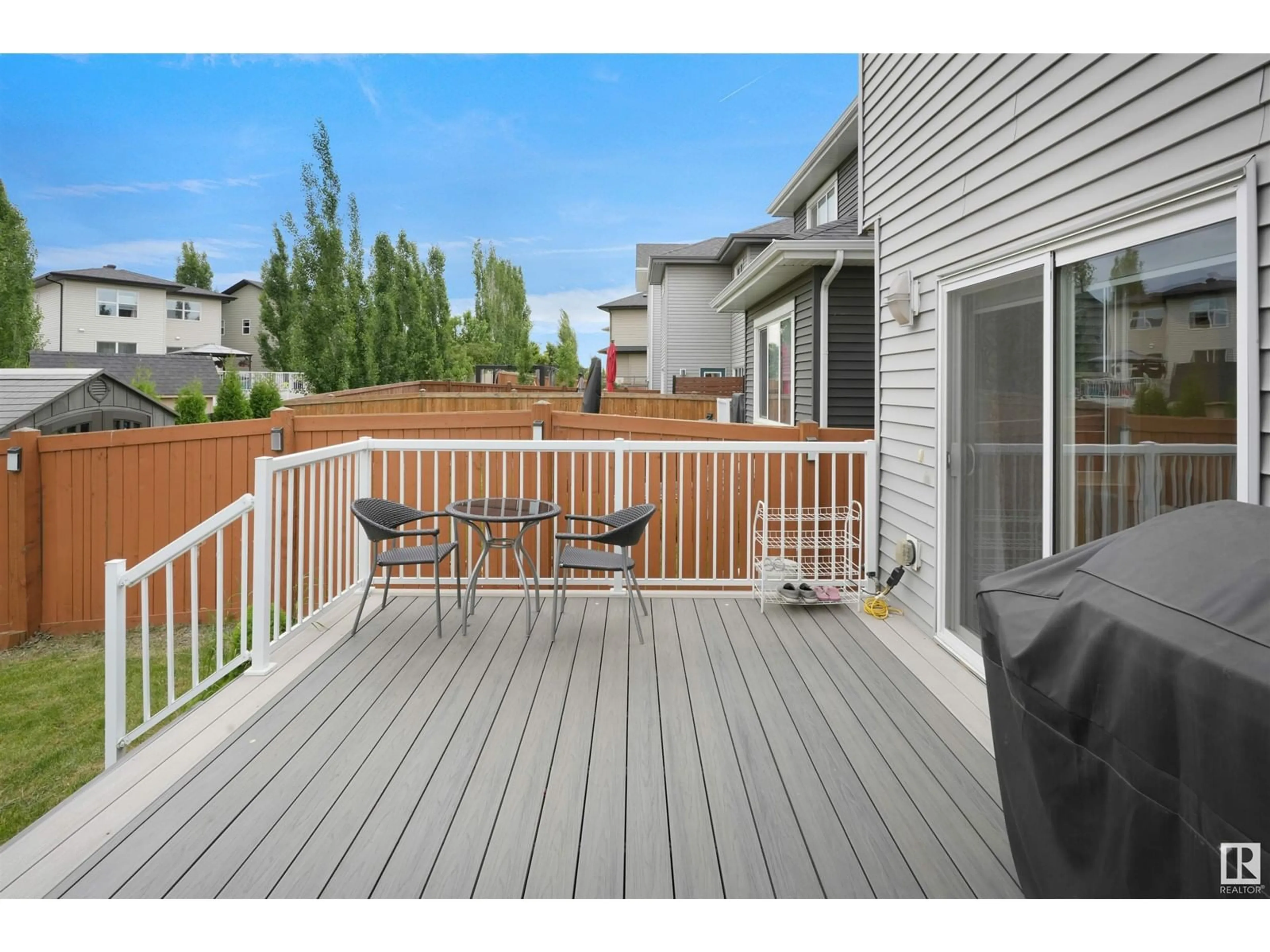 Patio, the fenced backyard for 22219 96 AV NW, Edmonton Alberta T5T7E5