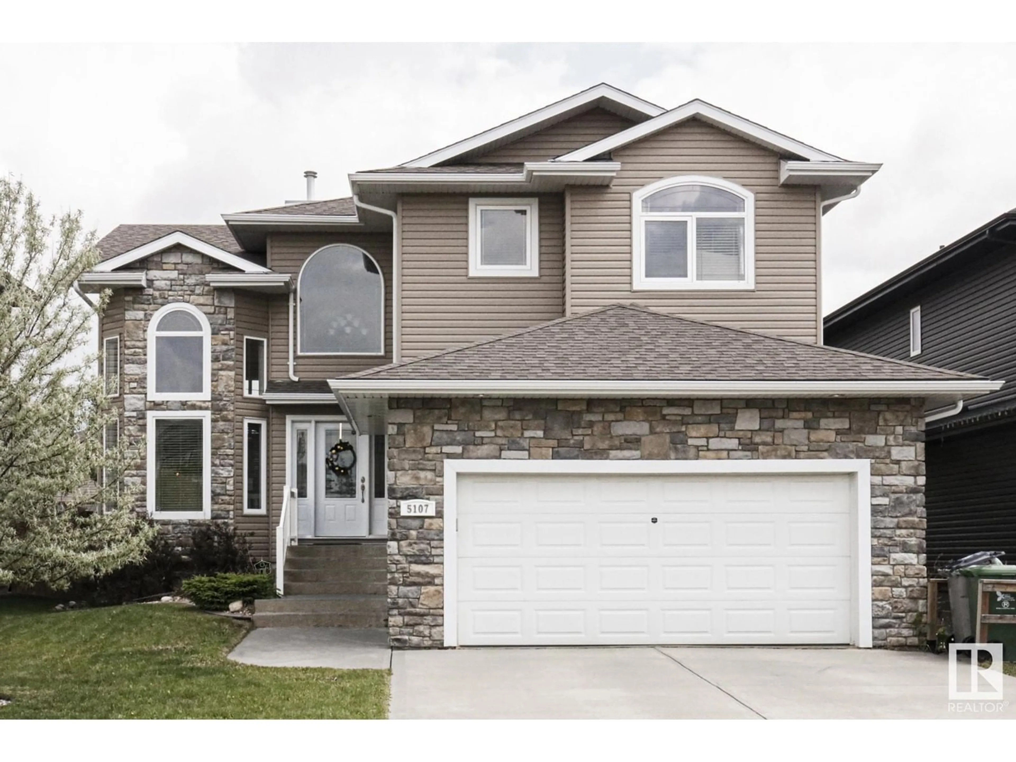 Frontside or backside of a home for 5107 63 ST, Beaumont Alberta T4X1V4