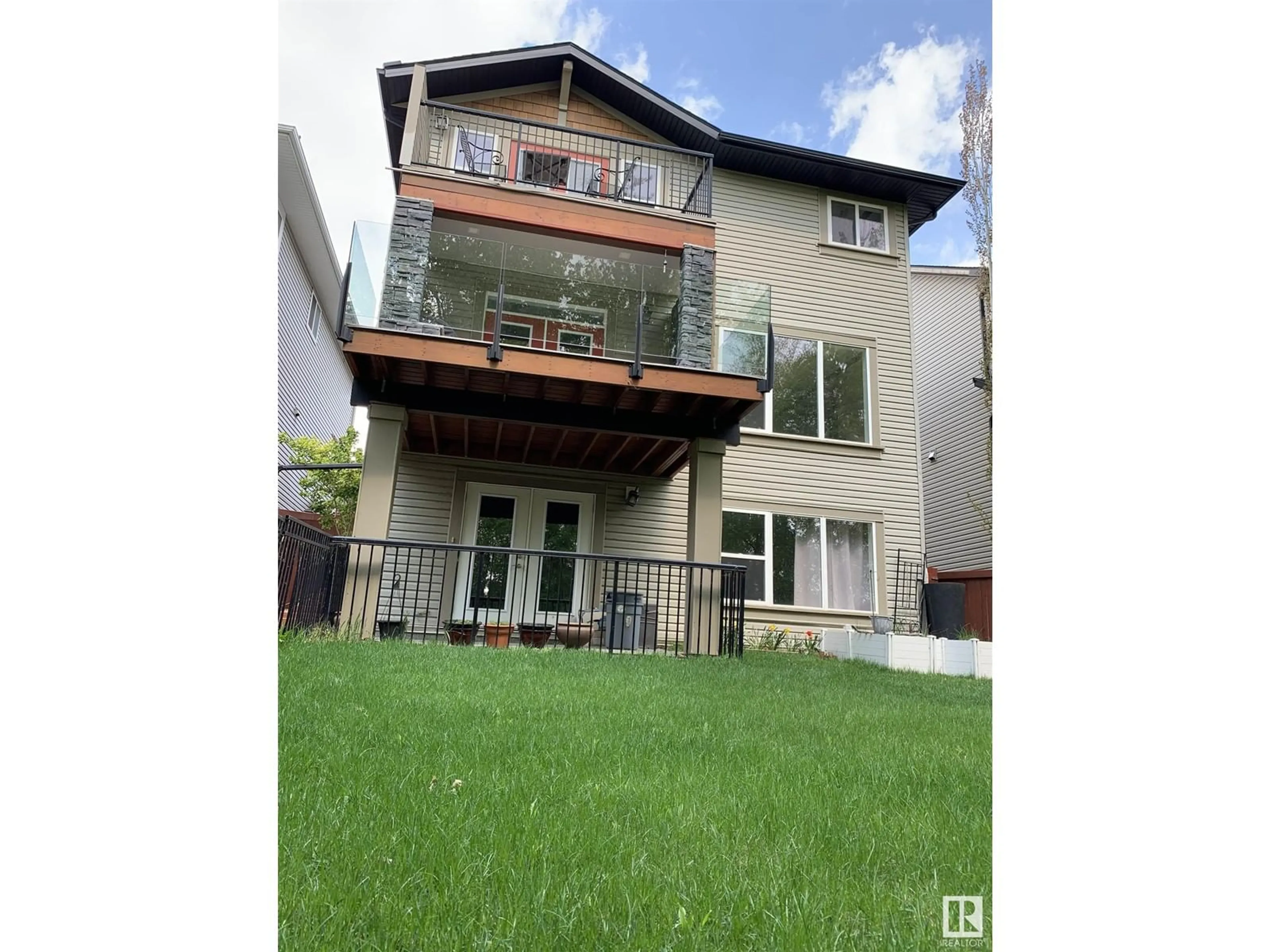 Frontside or backside of a home for 21857 95A AV NW, Edmonton Alberta T5T3Y6