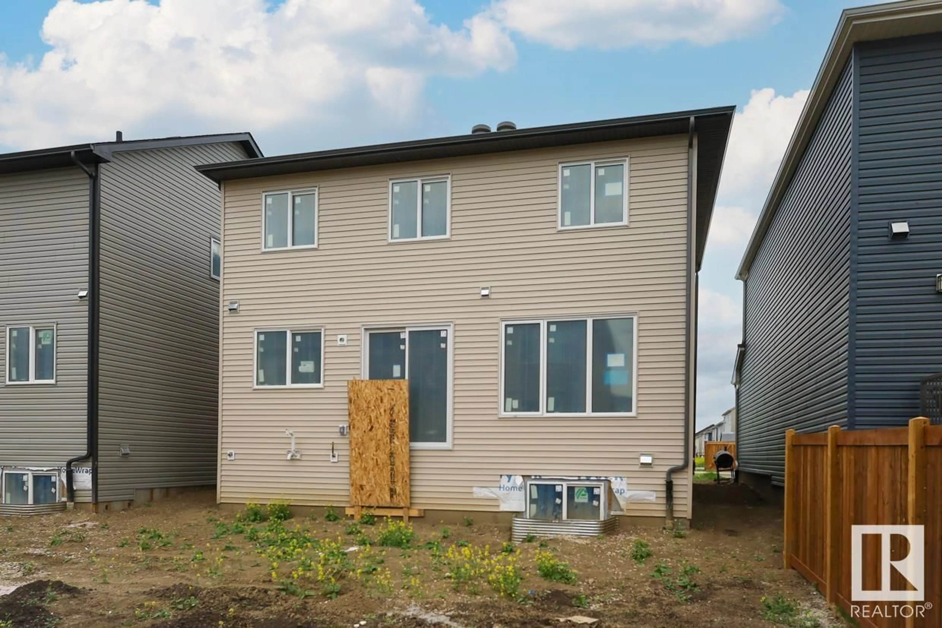 Frontside or backside of a home for 20719 20 AV NW, Edmonton Alberta T6M2P5