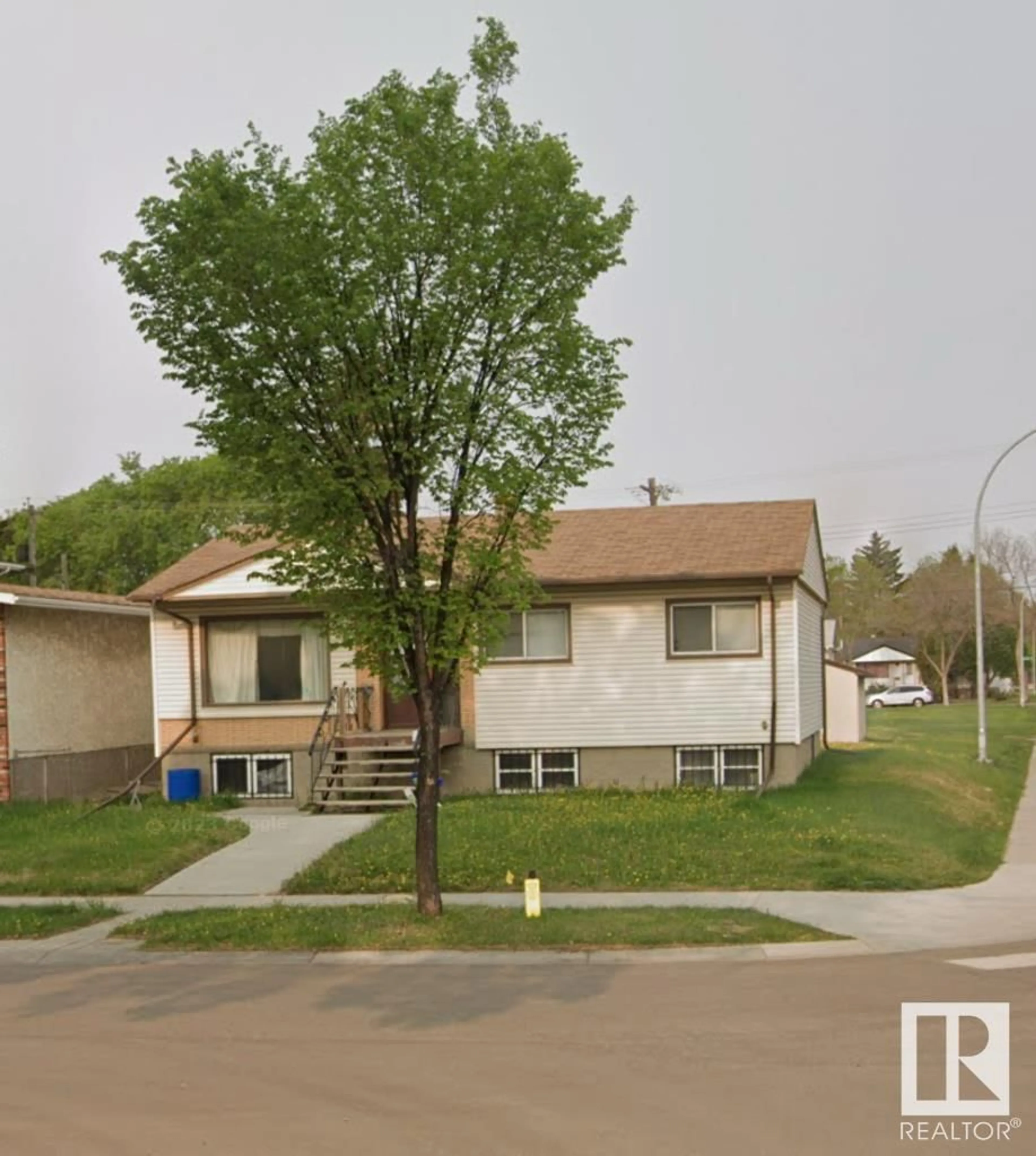 Frontside or backside of a home for 12414 128 ST NW, Edmonton Alberta T5L1C7