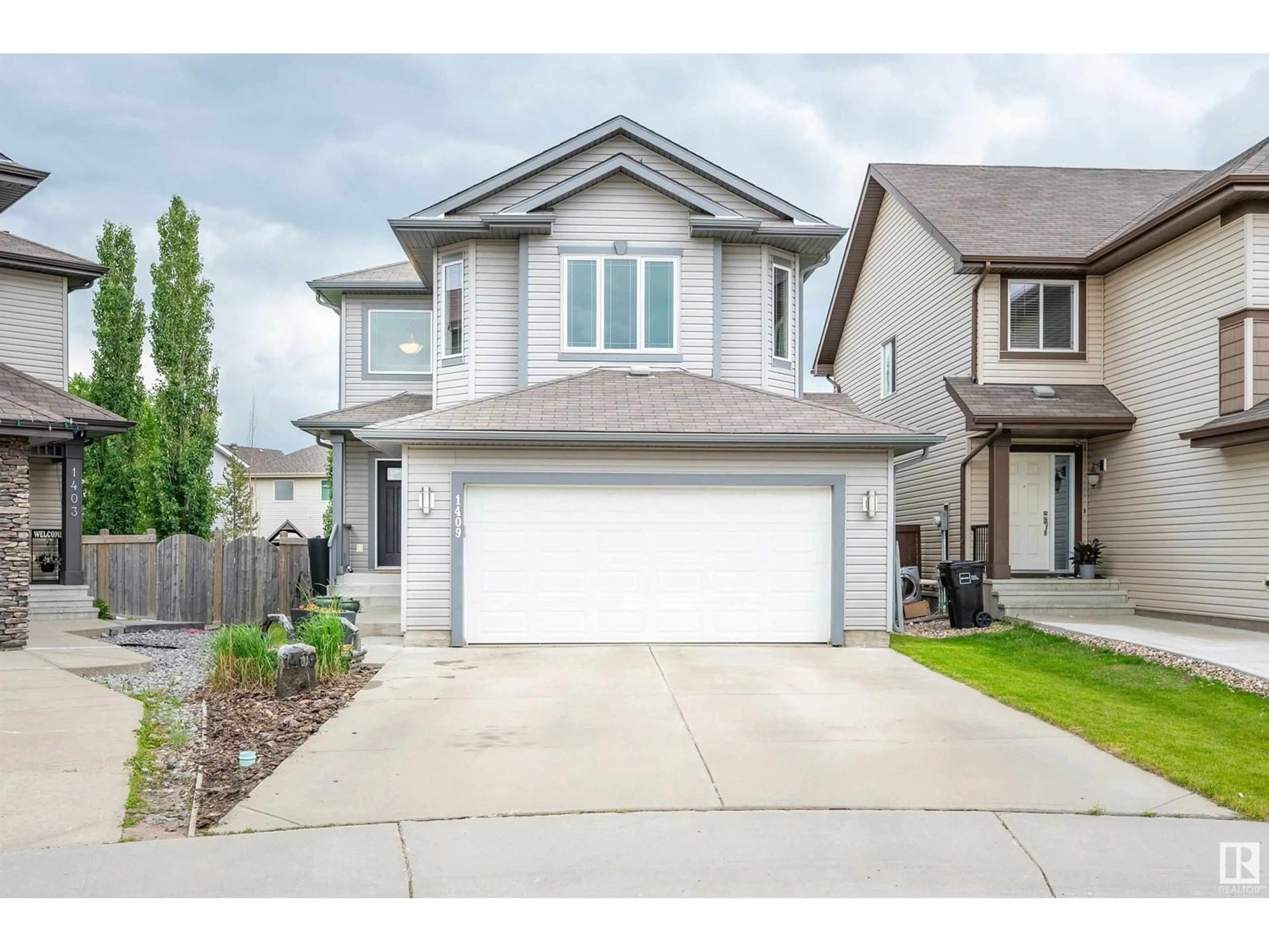 Frontside or backside of a home for 1409 37A AV NW, Edmonton Alberta T6T0H9