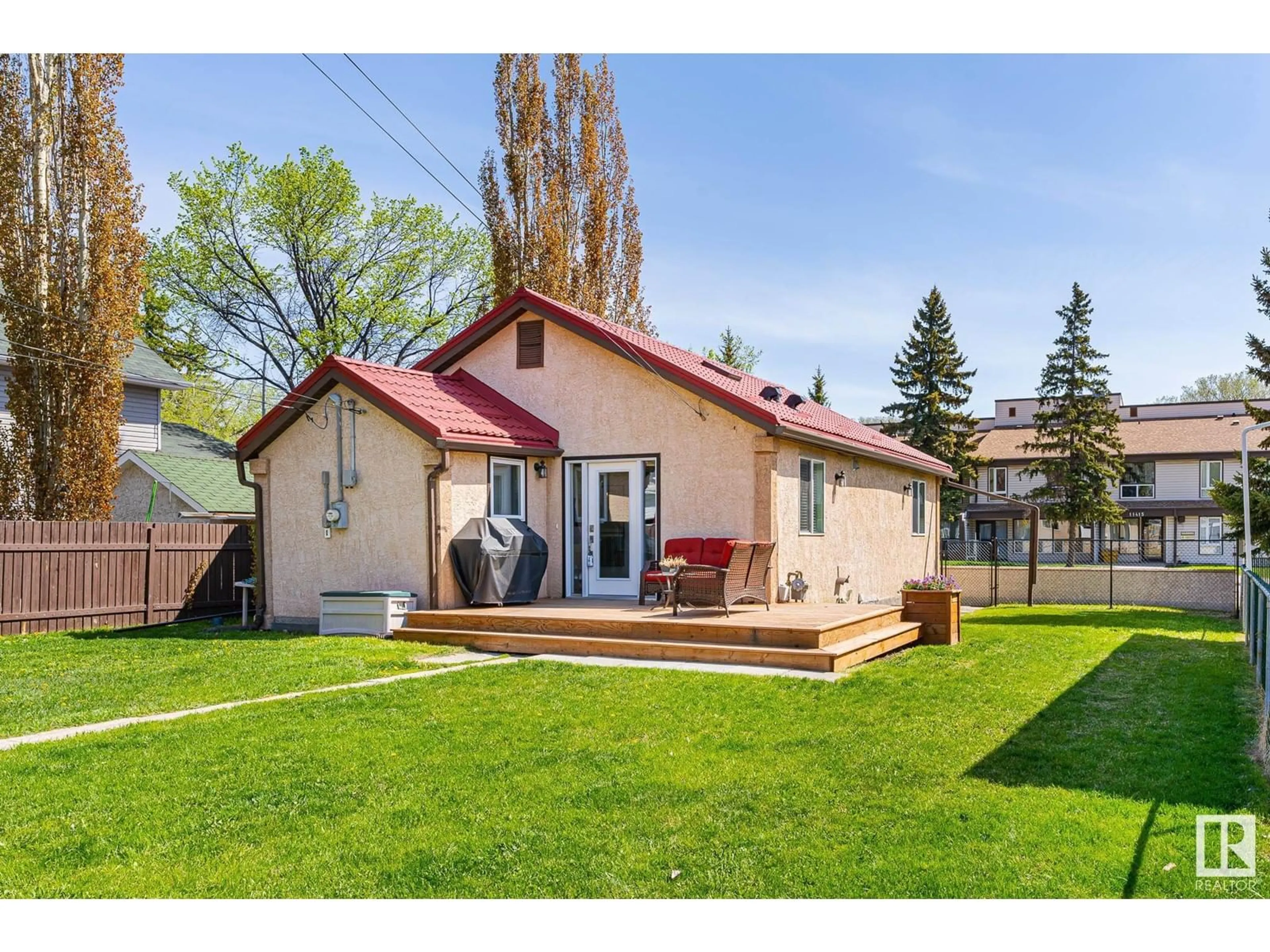 Frontside or backside of a home for 11424 86 ST NW, Edmonton Alberta T5B3J3