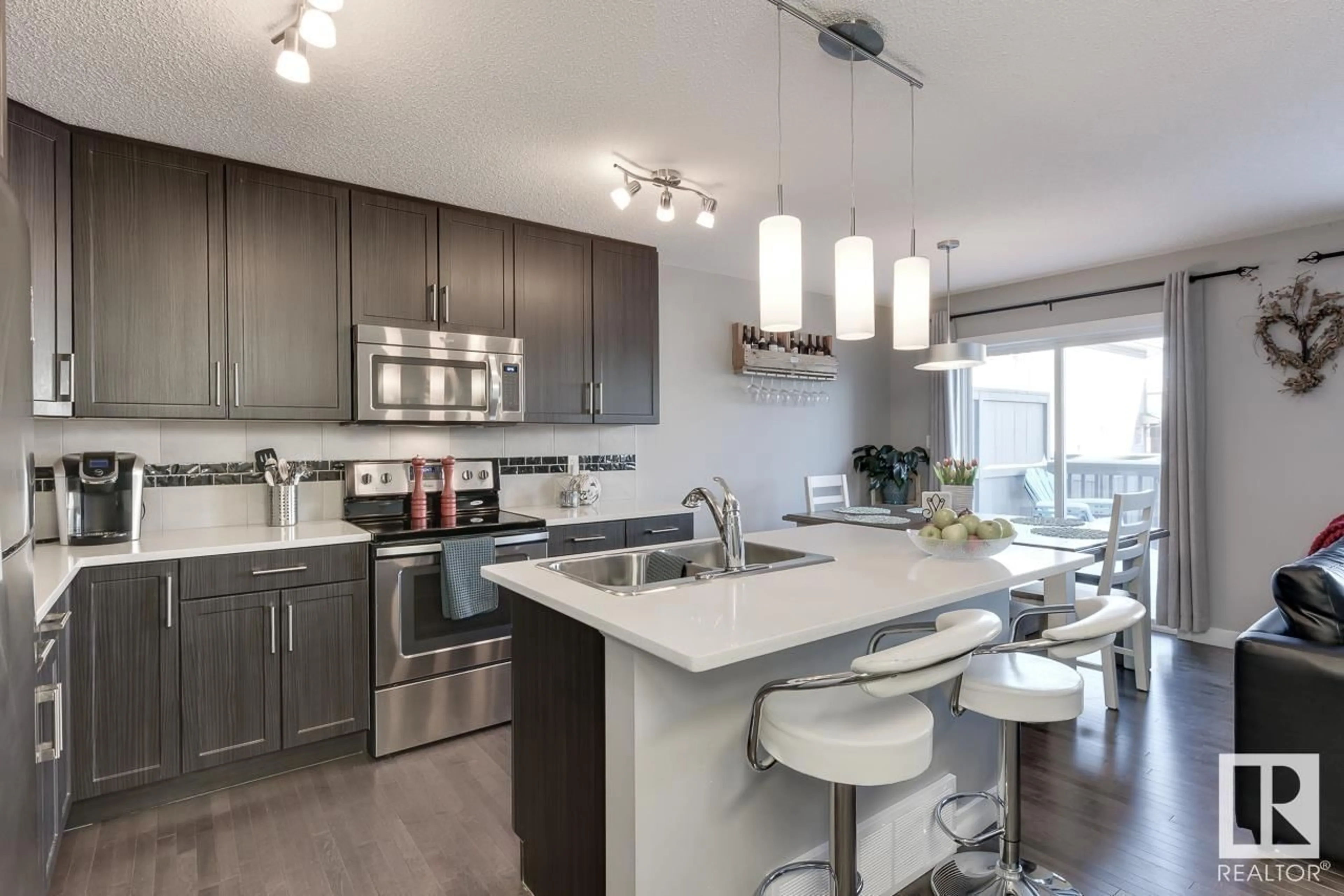 Contemporary kitchen for #22 2004 TRUMPETER WY NW, Edmonton Alberta T5S0J9