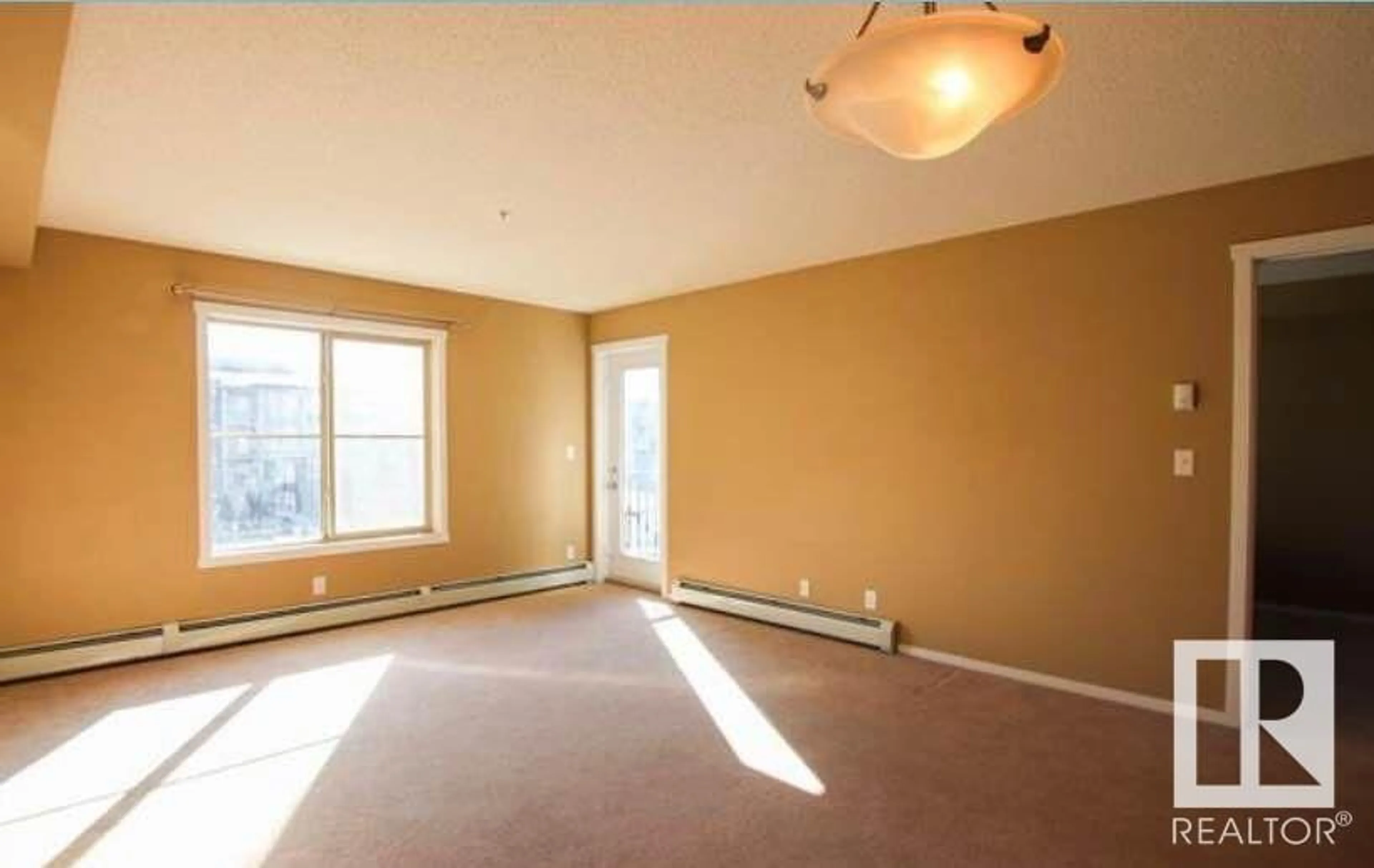 A pic of a room, wood floors for #308 3211 JAMES MOWATT TR SW, Edmonton Alberta T6W3L6