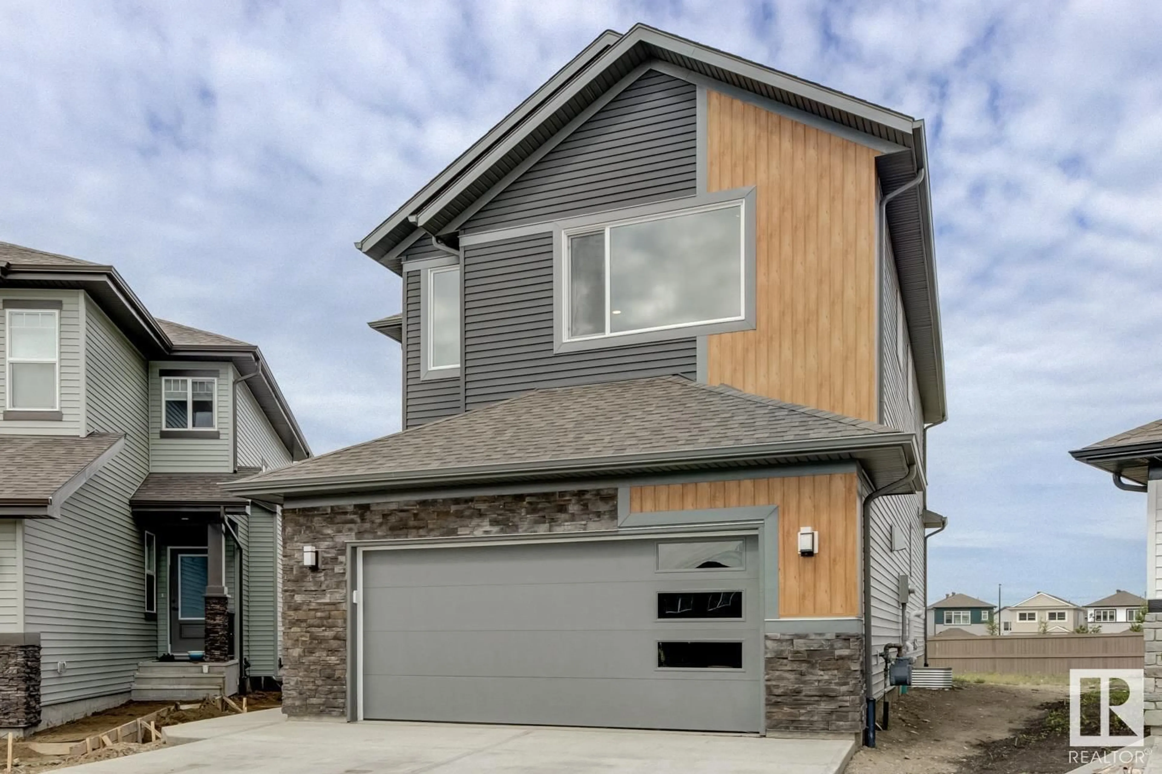 Frontside or backside of a home for 2029 13A AV NW, Edmonton Alberta T6T2R8