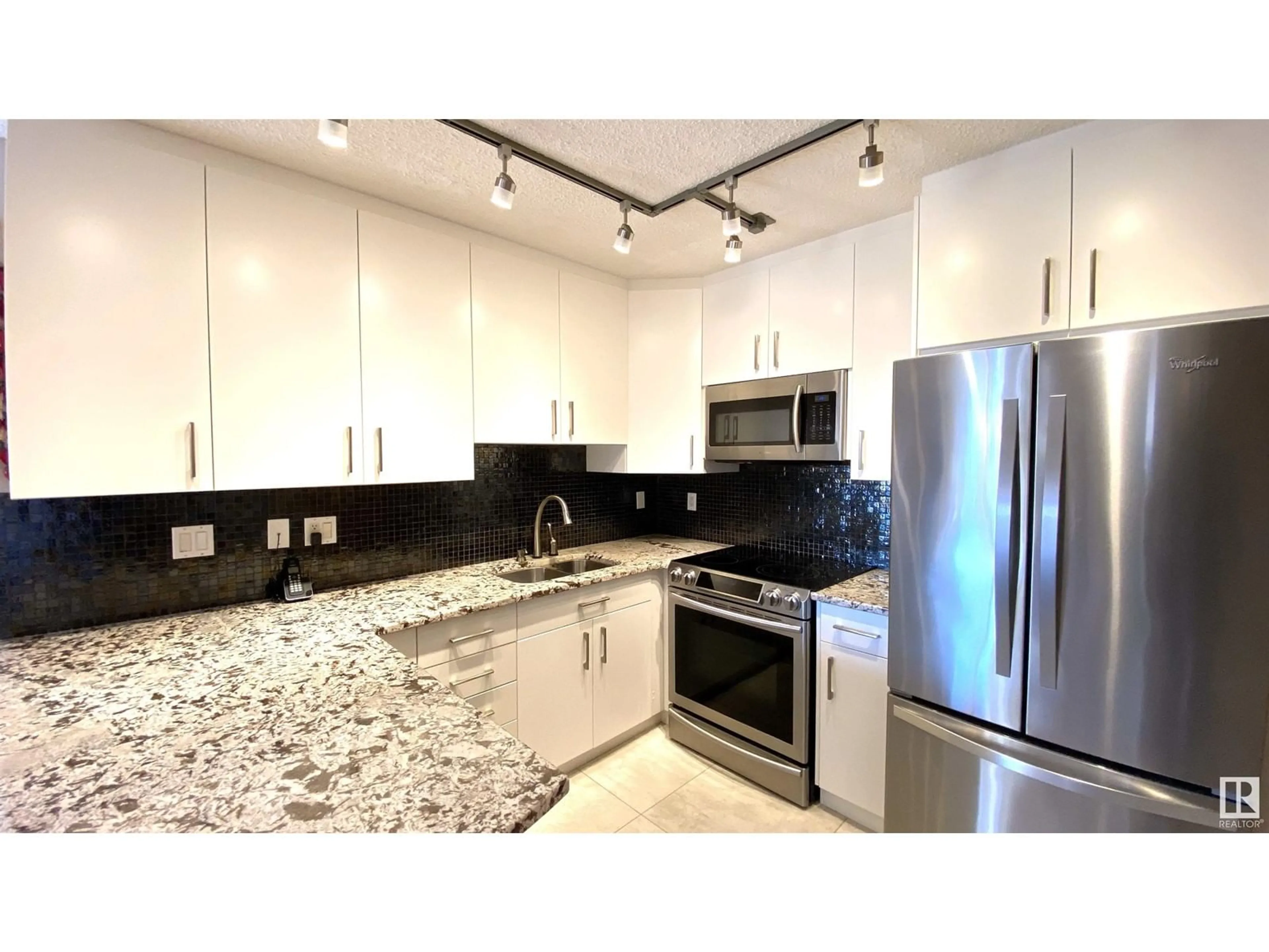 Contemporary kitchen for #603 9741 110 ST NW, Edmonton Alberta T5K2V8