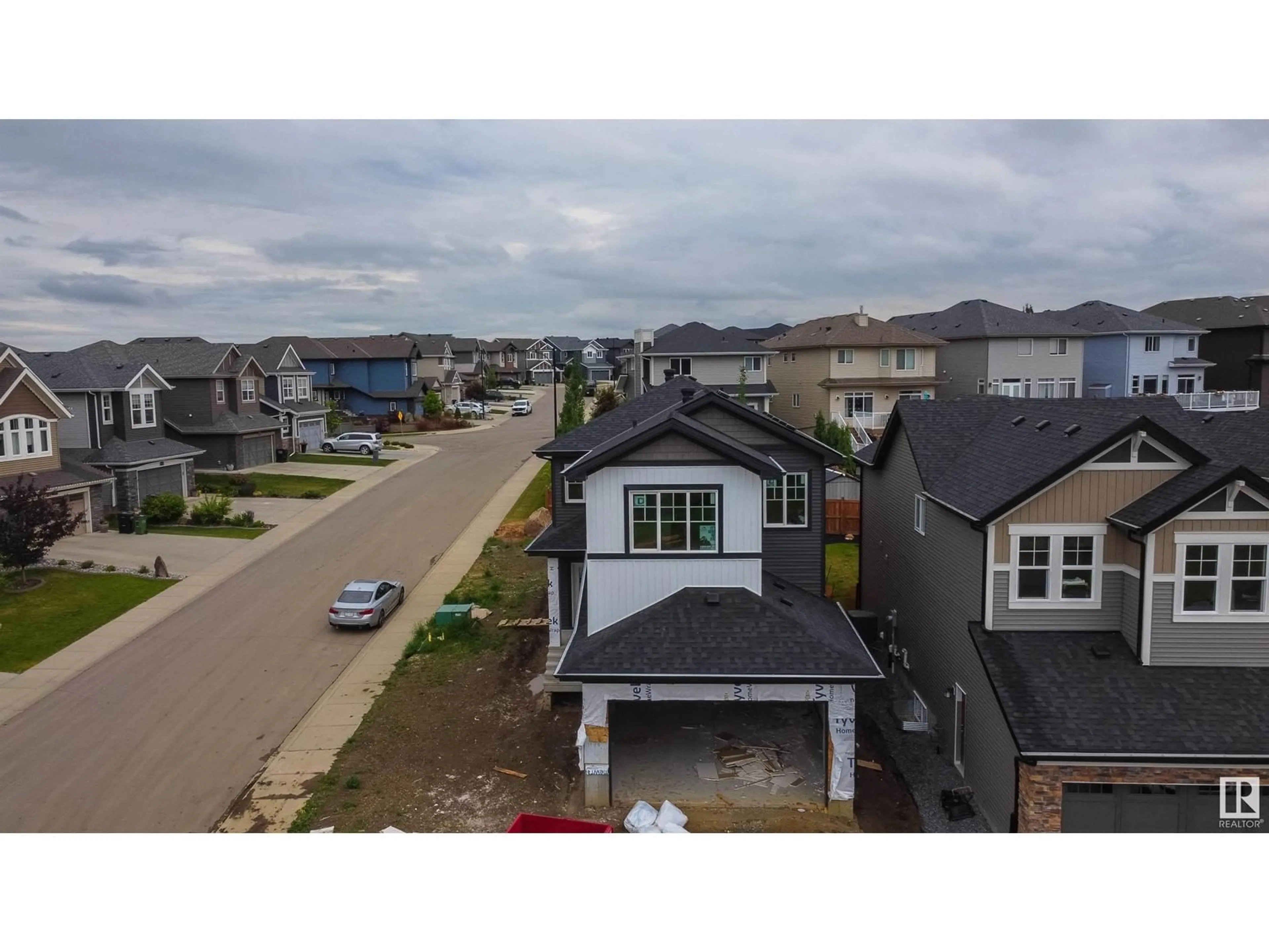 Frontside or backside of a home for 1178 GYRFALCON CR NW, Edmonton Alberta T5S0S1