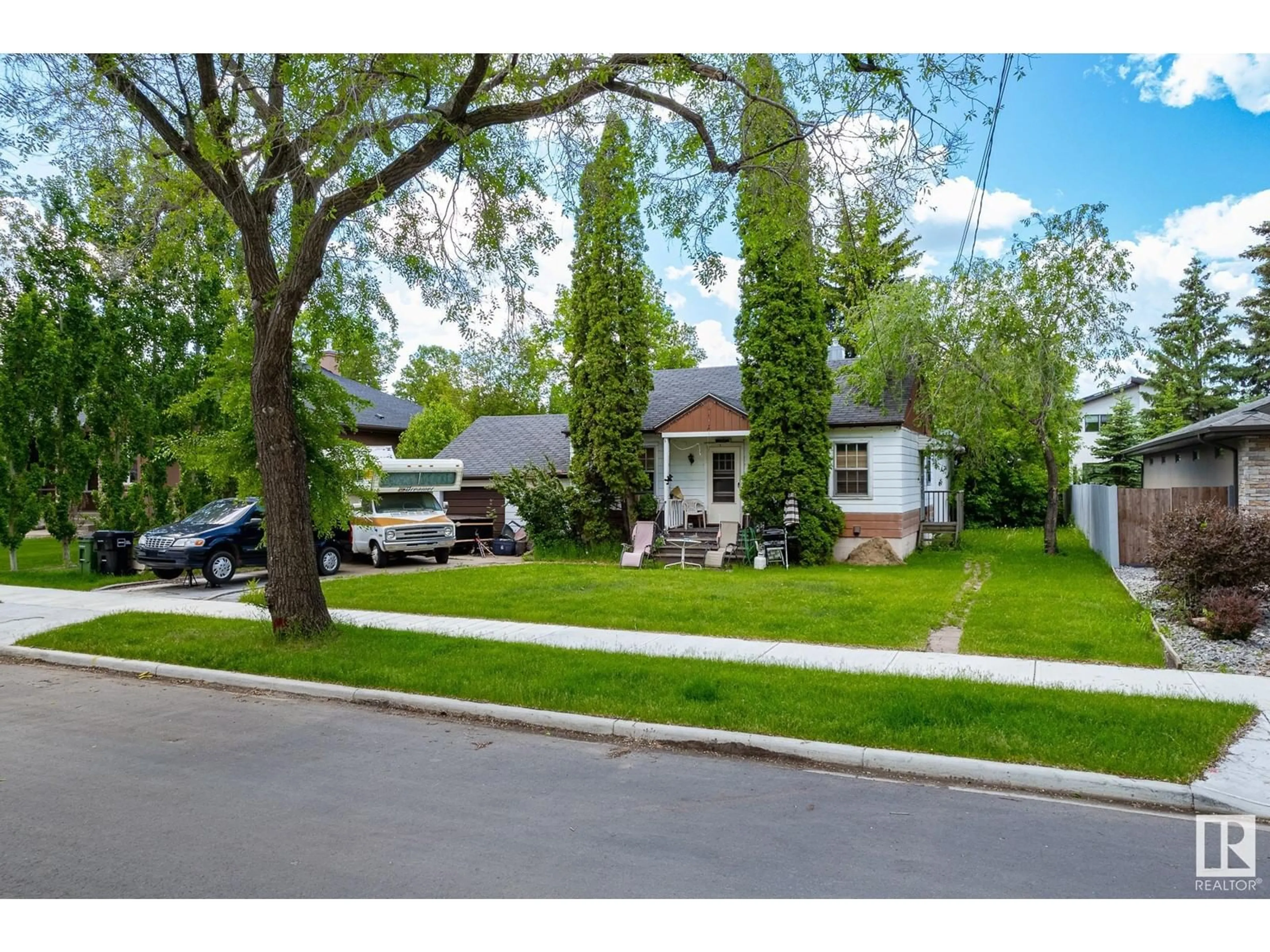 Frontside or backside of a home for 10807 60 AV NW, Edmonton Alberta T6H1H4