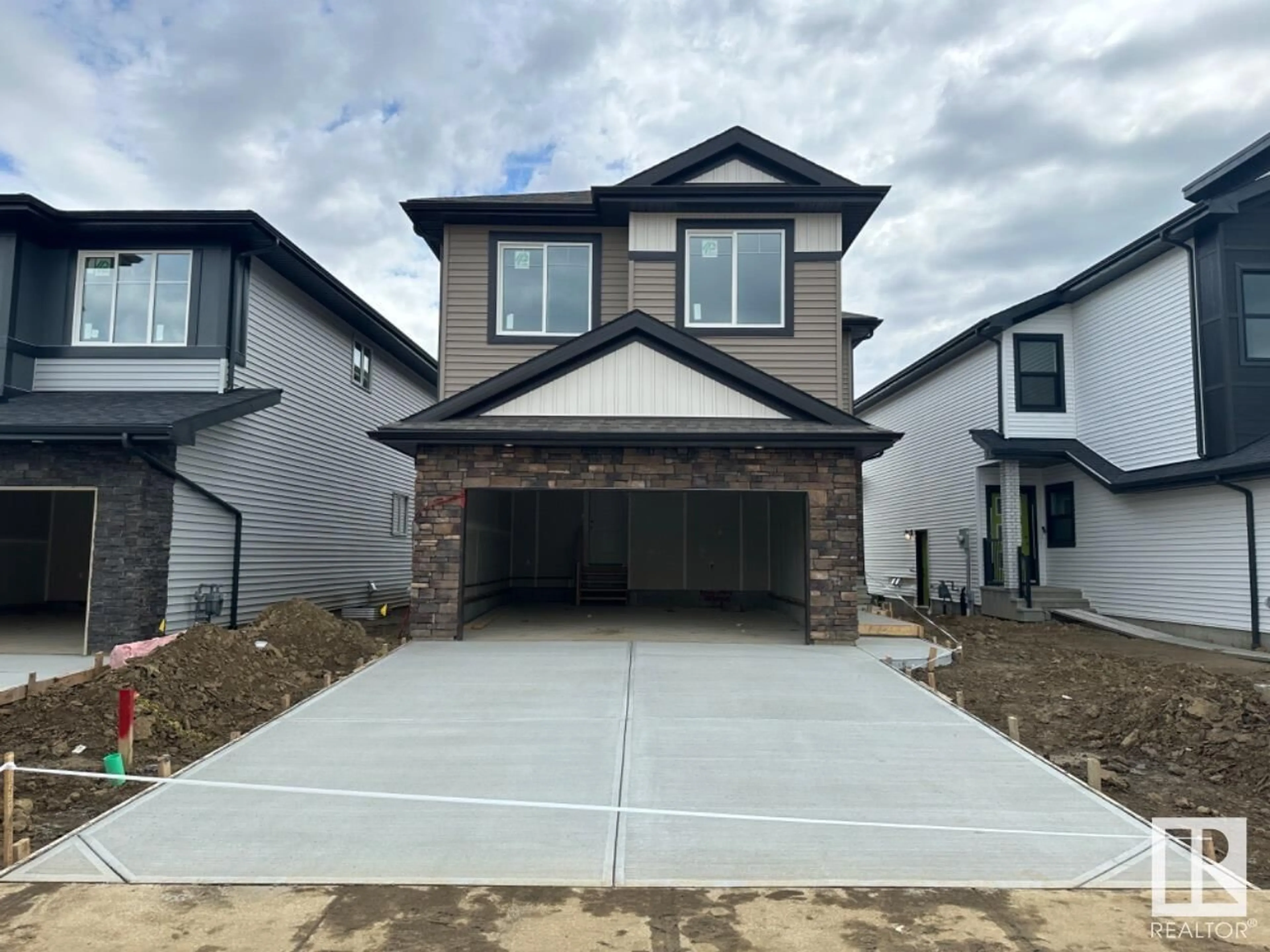 Frontside or backside of a home for 664 KINGLET BV NW, Edmonton Alberta T5S0S8