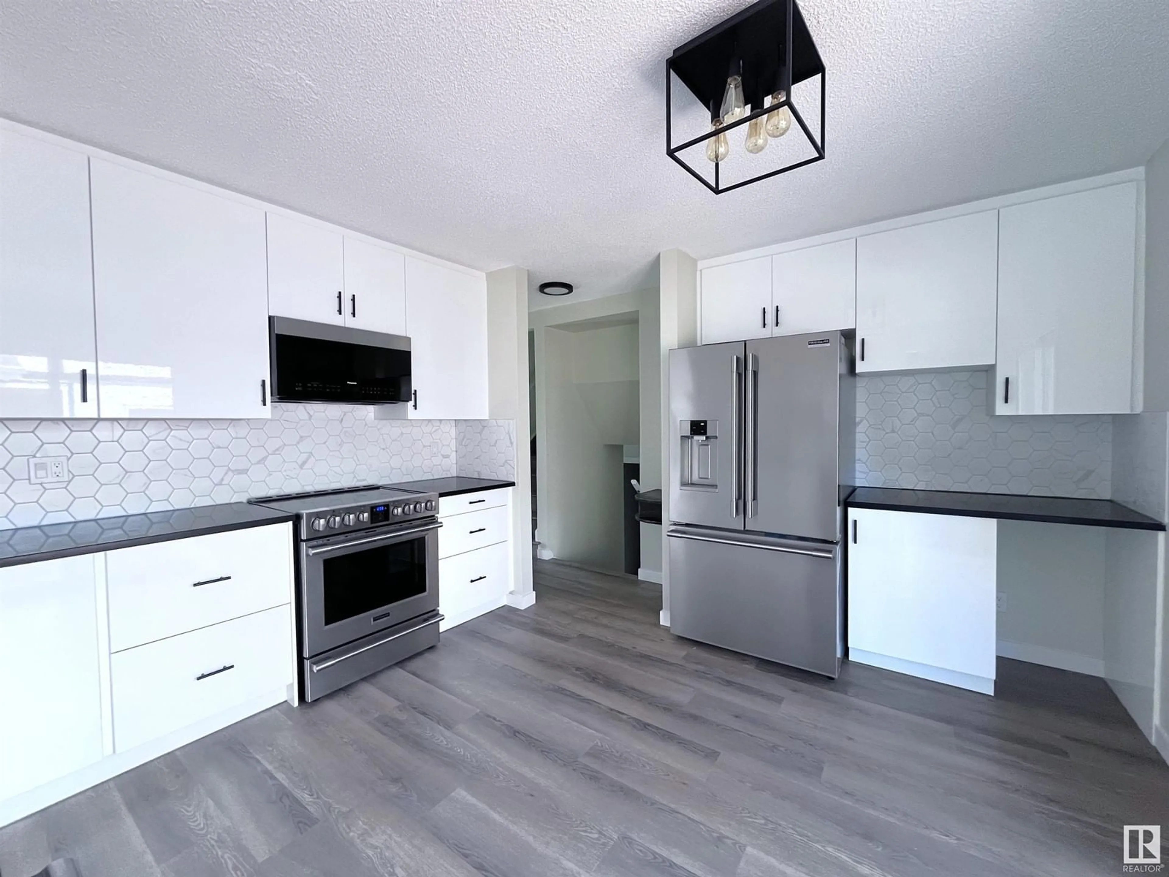 Contemporary kitchen for 99 WAHSTAO CR NW, Edmonton Alberta T5T2W9