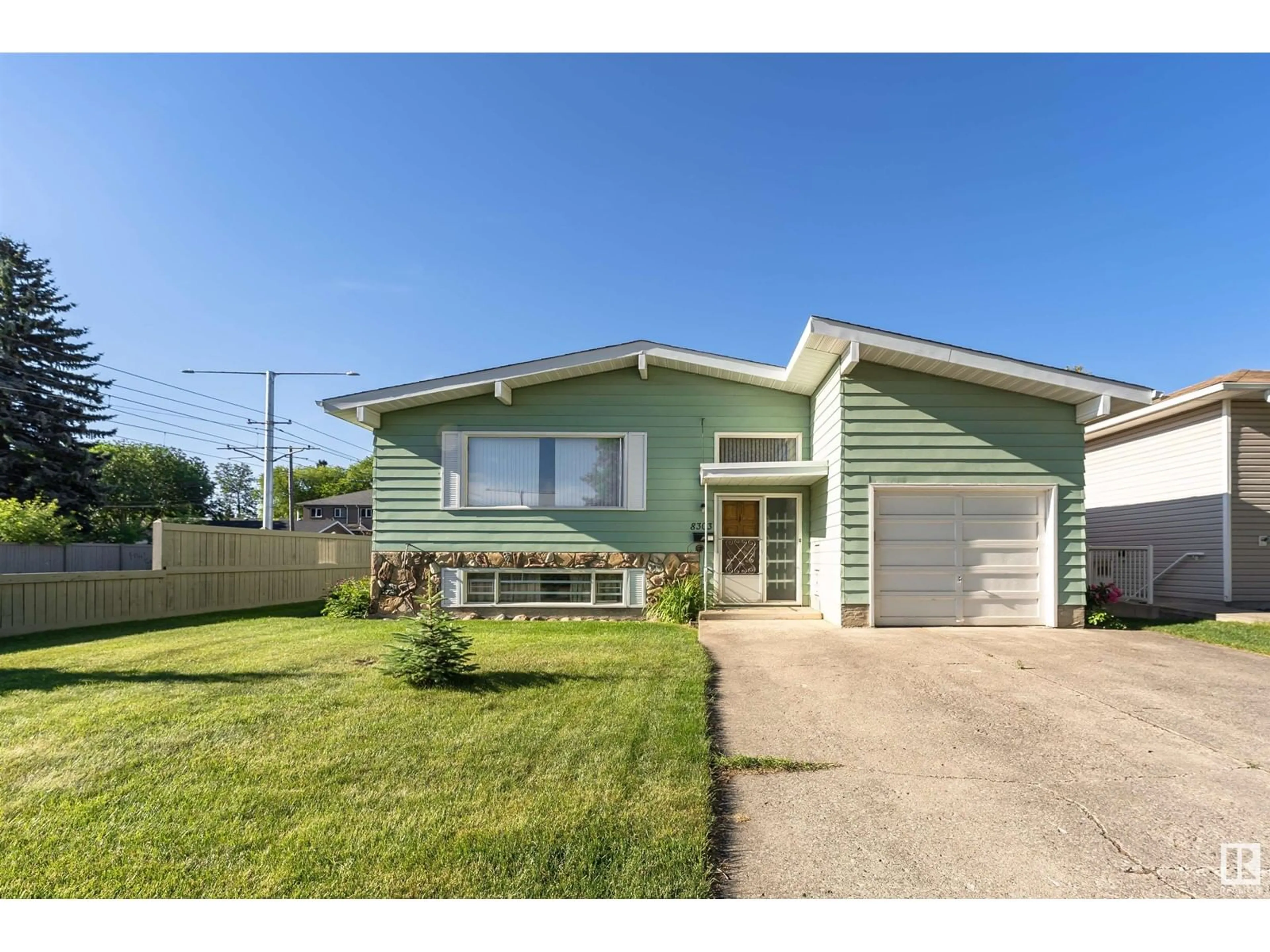 Frontside or backside of a home for 8303 80 AV NW, Edmonton Alberta T6C0S9