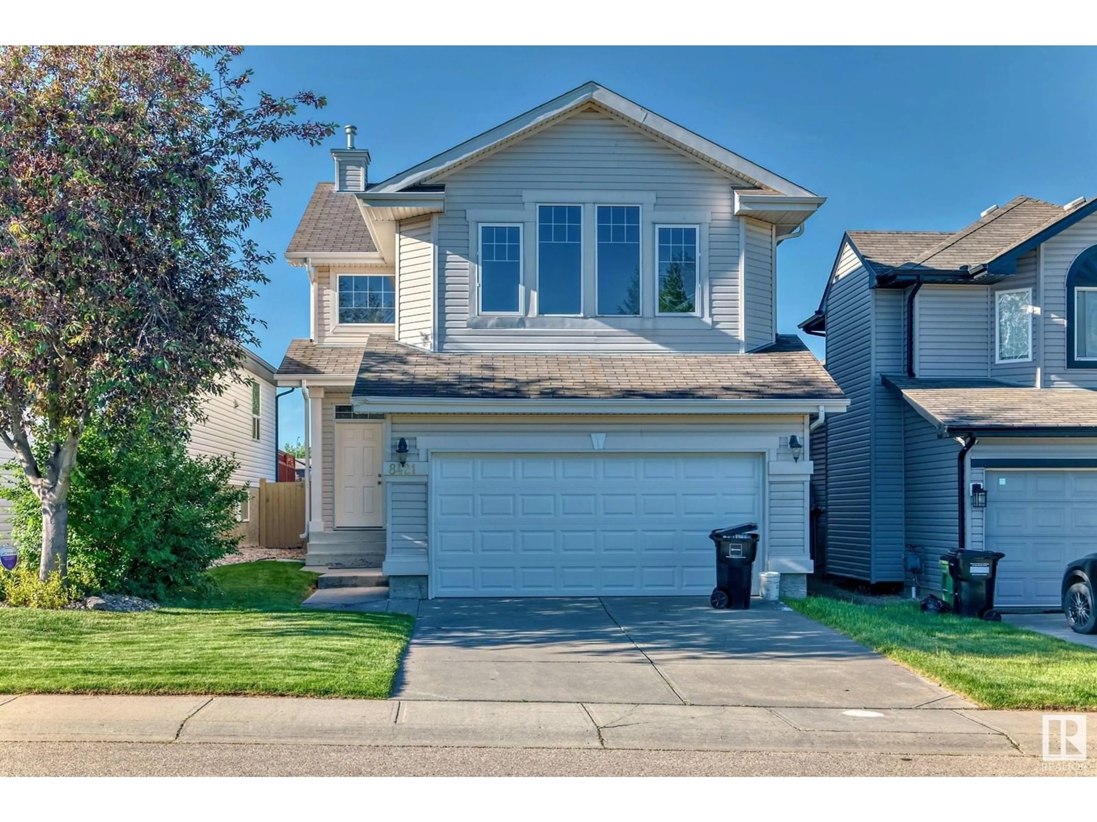 Frontside or backside of a home for 8421 6 AV SW, Edmonton Alberta T6X1J1