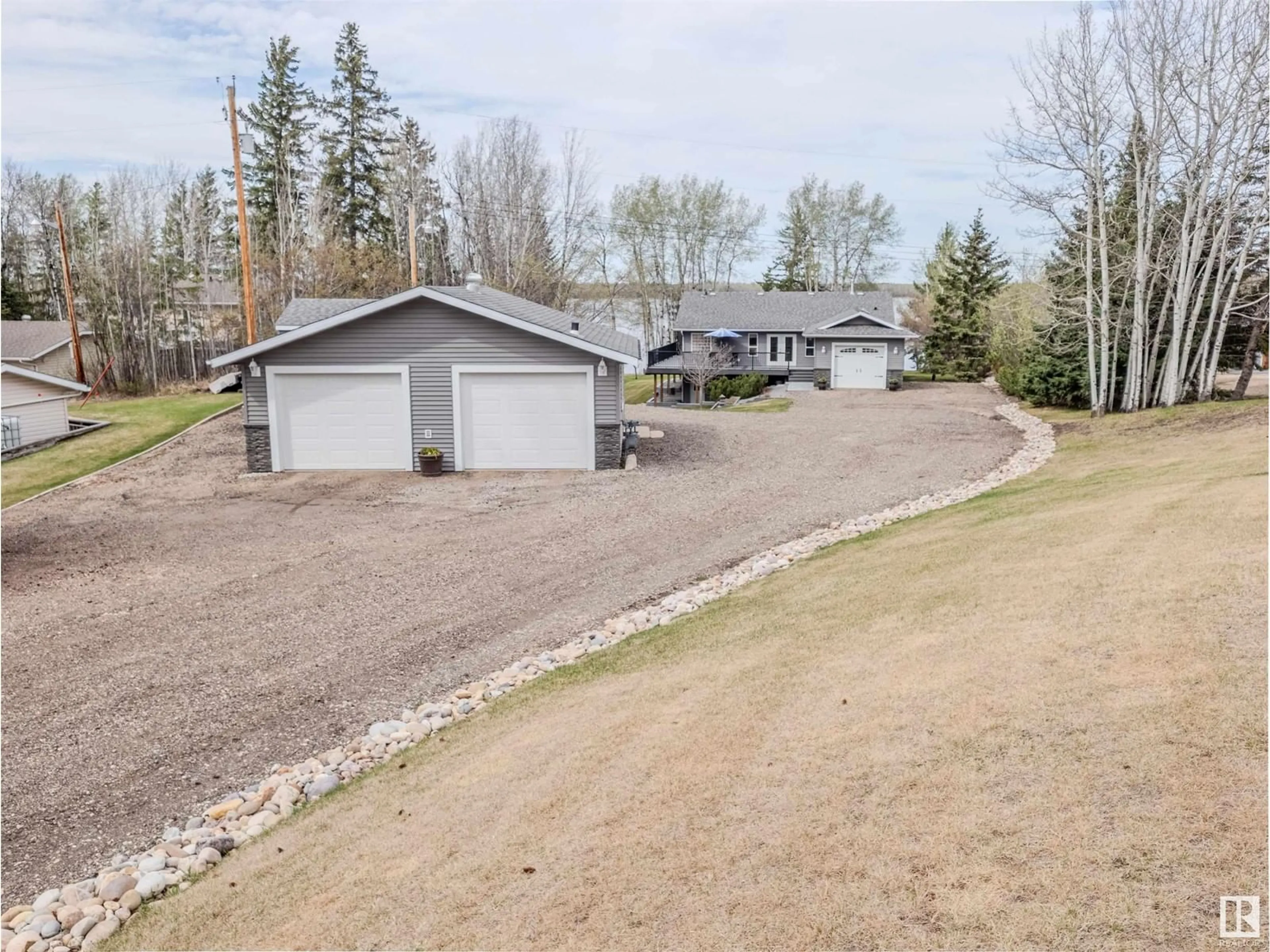 Frontside or backside of a home for 5551B Nakamun Drive, Rural Lac Ste. Anne County Alberta T0E1A0