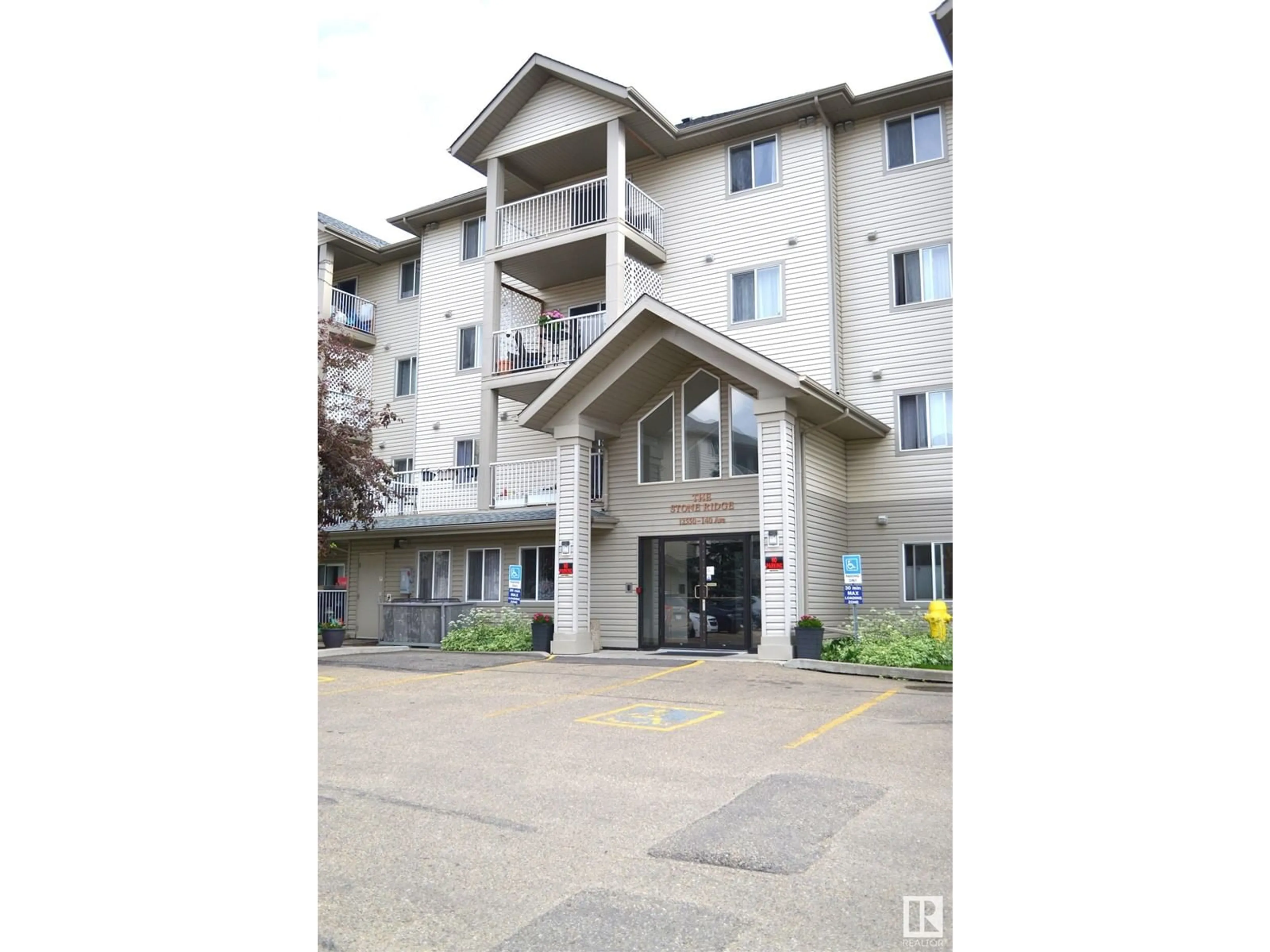 A pic from exterior of the house or condo for #319 12550 140 Ave NW, Edmonton Alberta T5X6J4