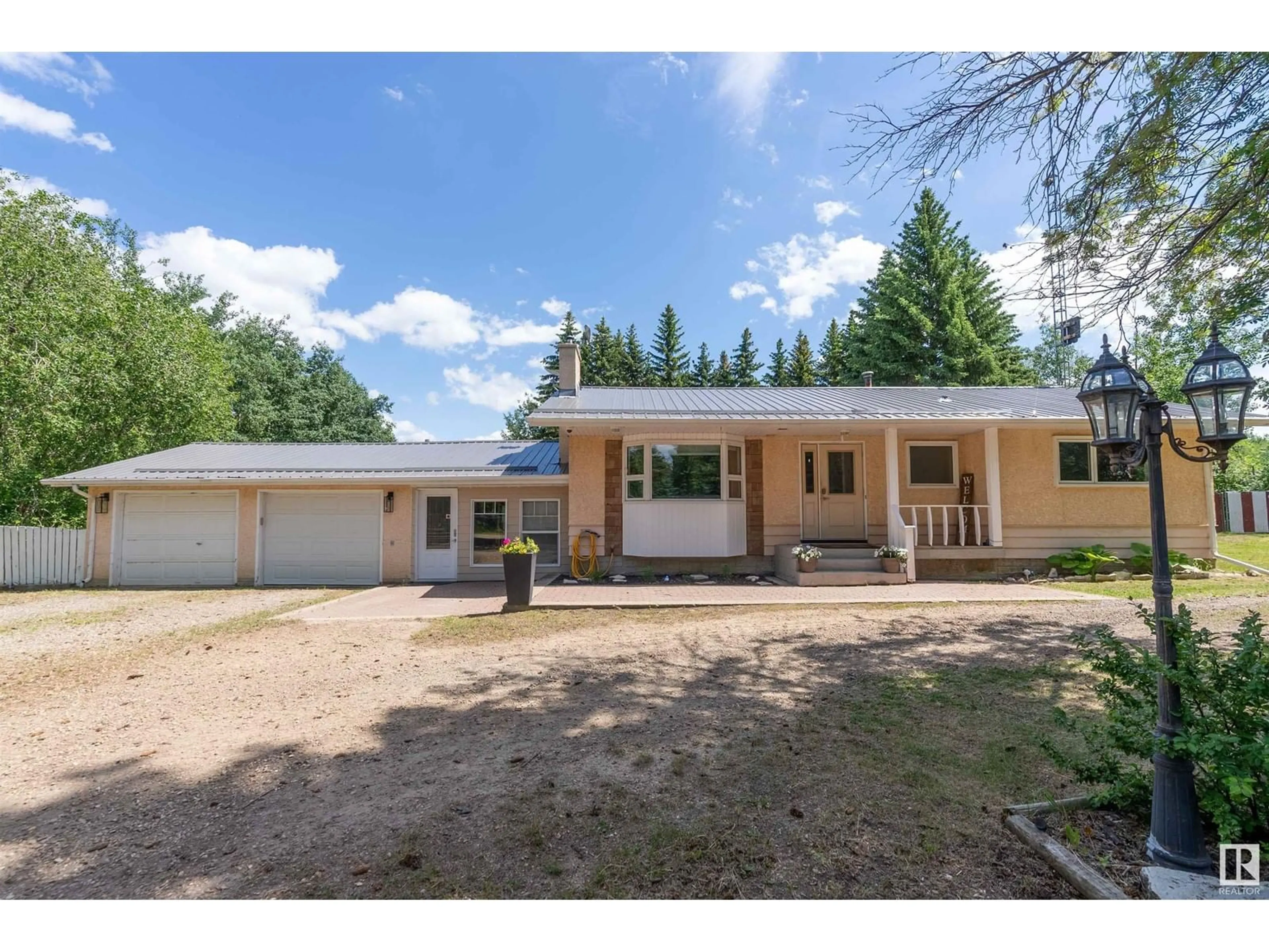 Frontside or backside of a home for 110 49547 Range Road 243, Rural Leduc County Alberta T4X1Z8