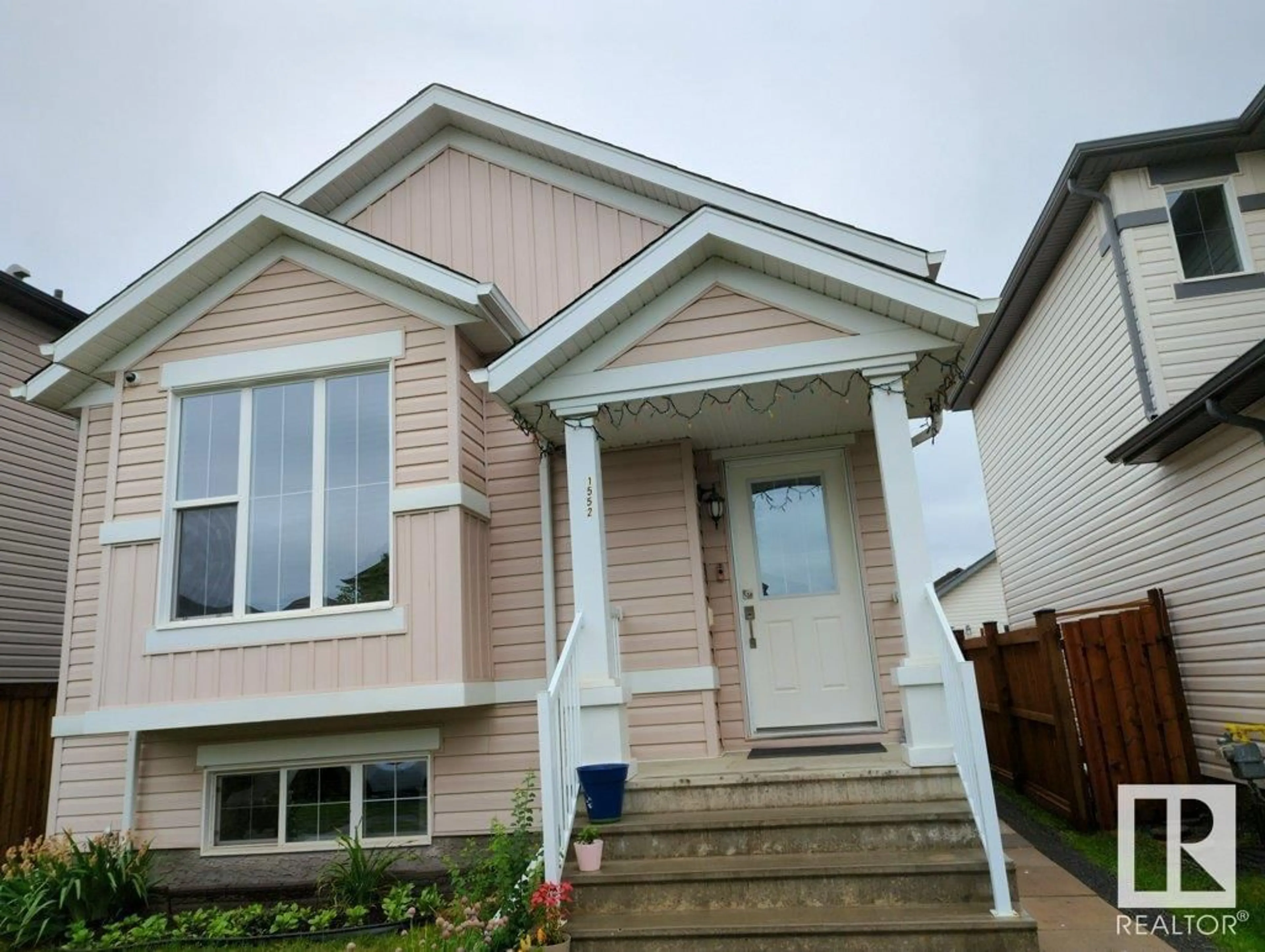 Frontside or backside of a home for 1552 35 AV NW NW, Edmonton Alberta T6T0M9