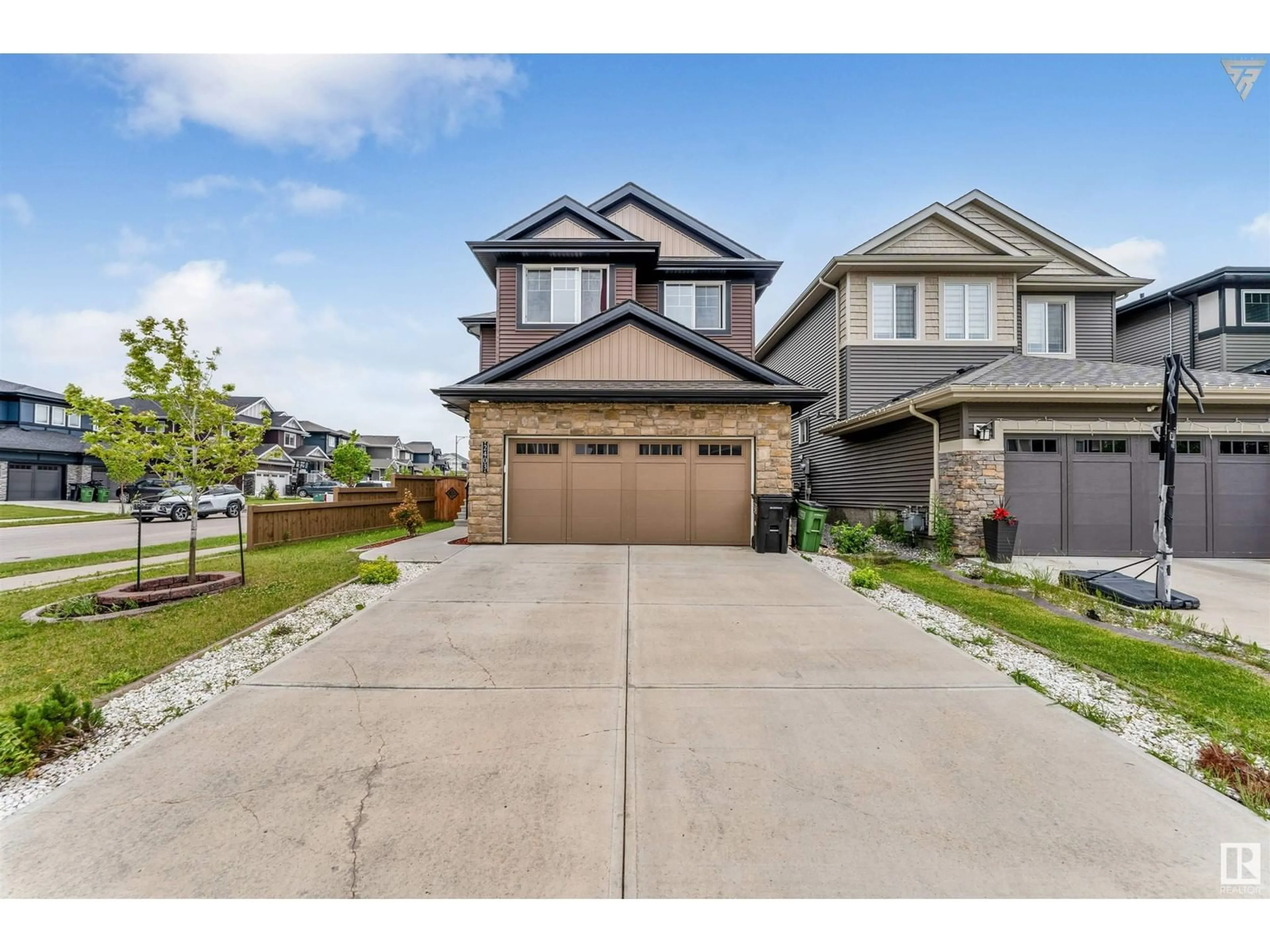 Frontside or backside of a home for 2403 WONNACOTT CO SW, Edmonton Alberta T6X2K5