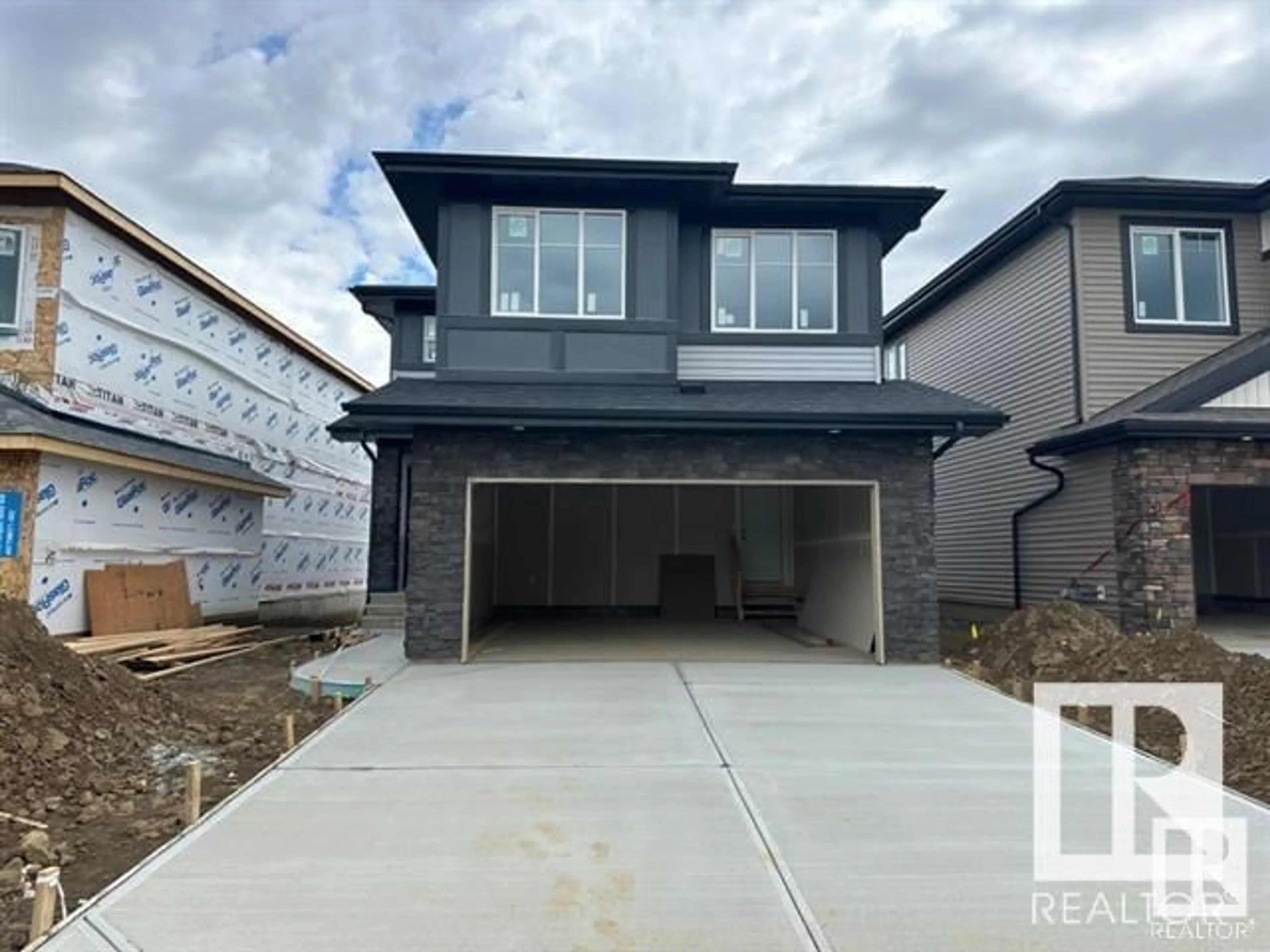 Frontside or backside of a home for 666 KINGLET BV NW, Edmonton Alberta T5S2B9