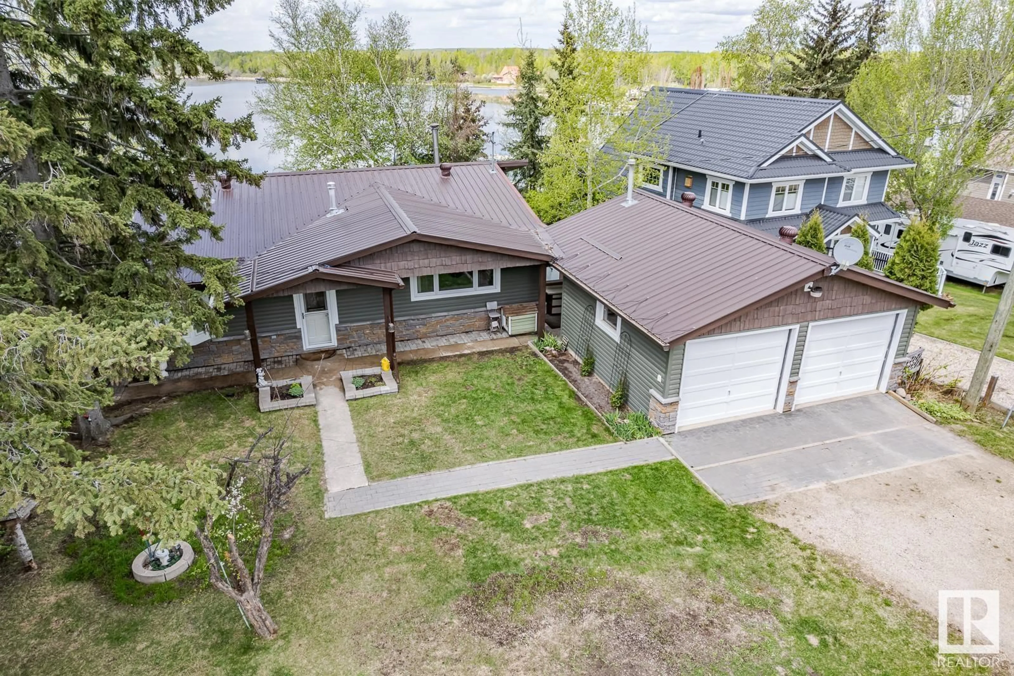 Frontside or backside of a home for 611 3003 TWP 574, Rural Barrhead County Alberta T0E1A0