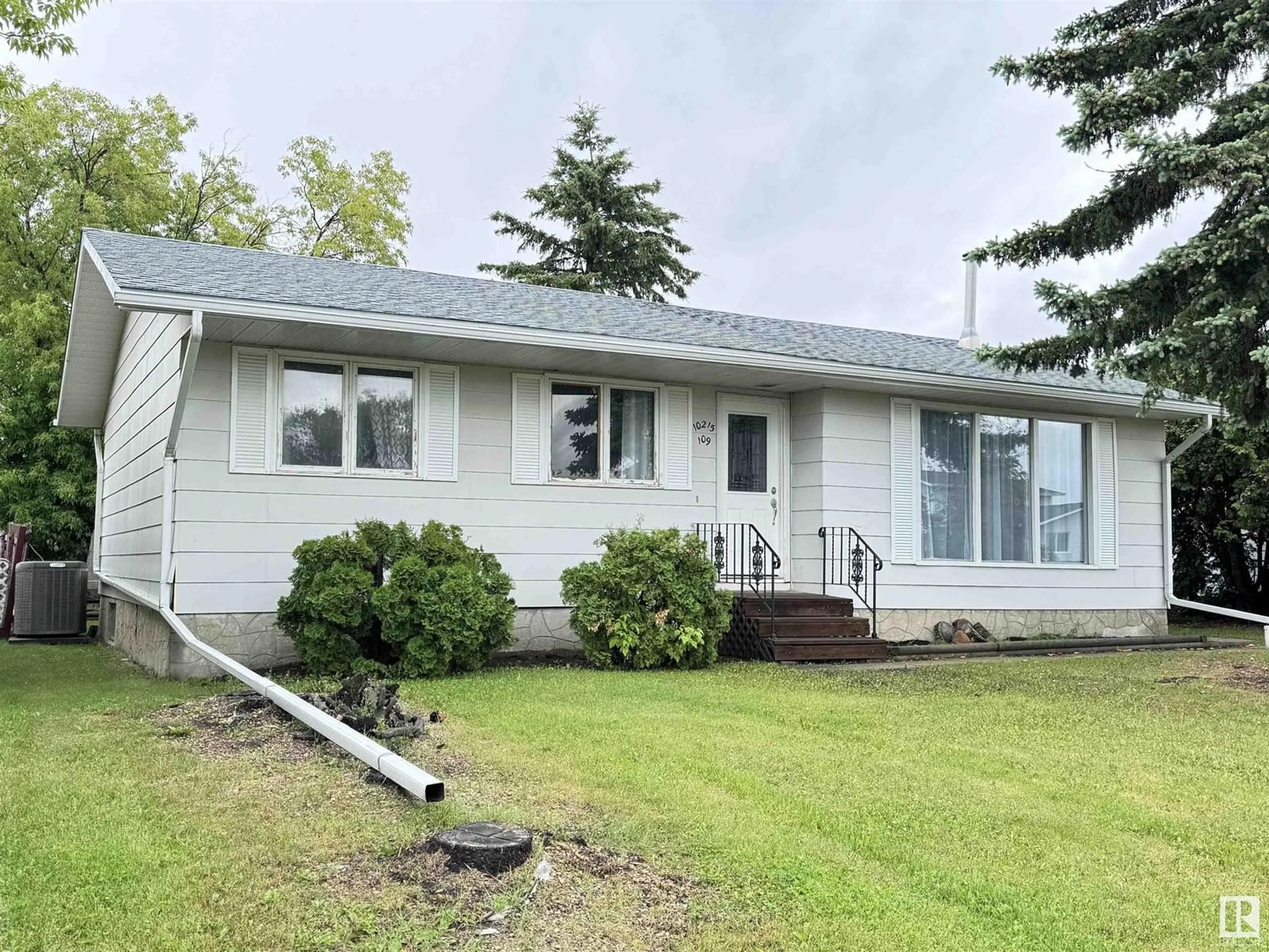 Frontside or backside of a home for 10215 109 AV, Westlock Alberta T7P1H1