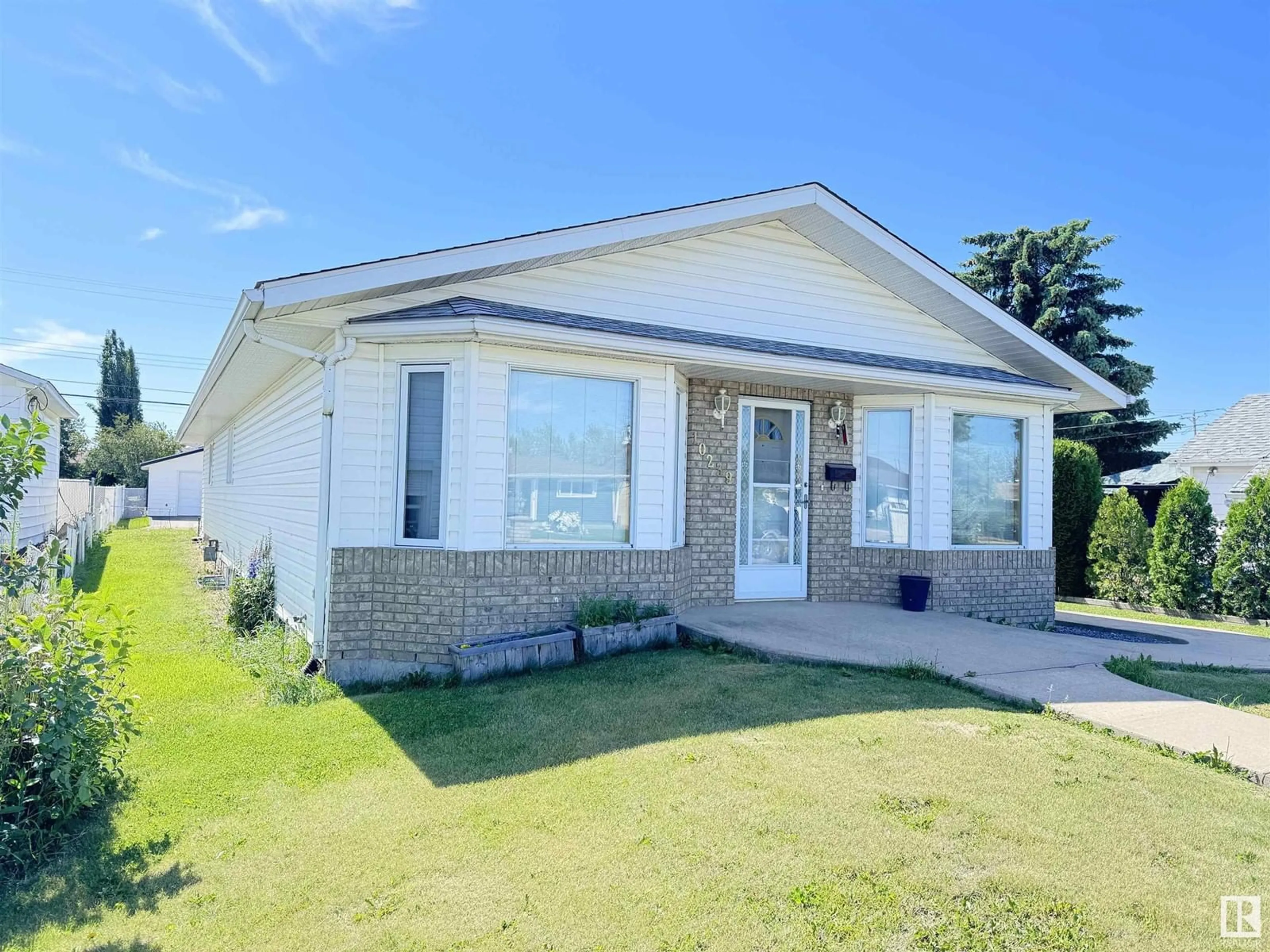 Frontside or backside of a home for 10239 107 ST, Westlock Alberta T7P1X1