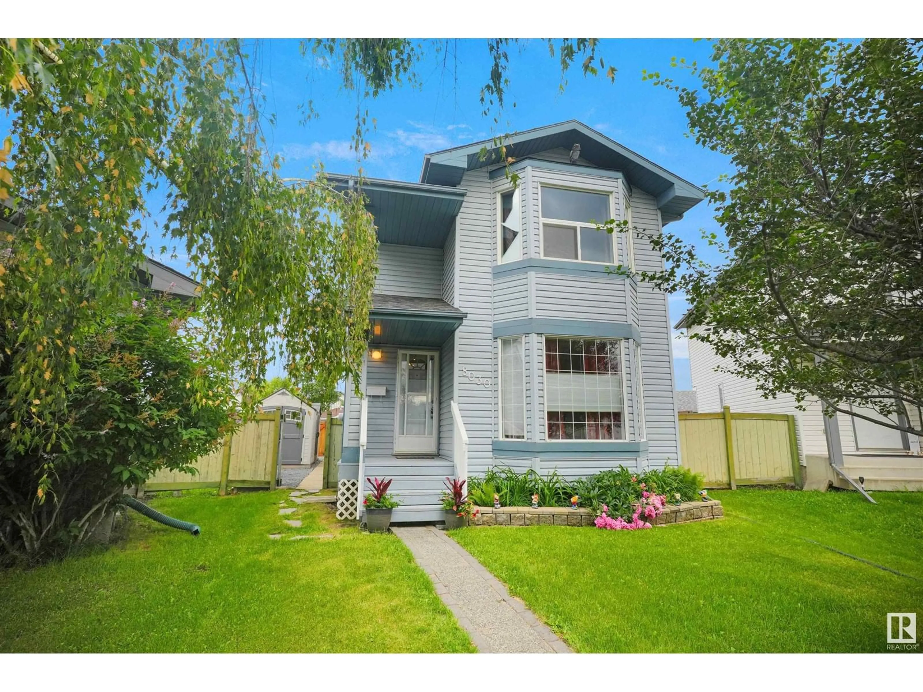 Frontside or backside of a home for 8030 15A AV NW, Edmonton Alberta T6K4E4