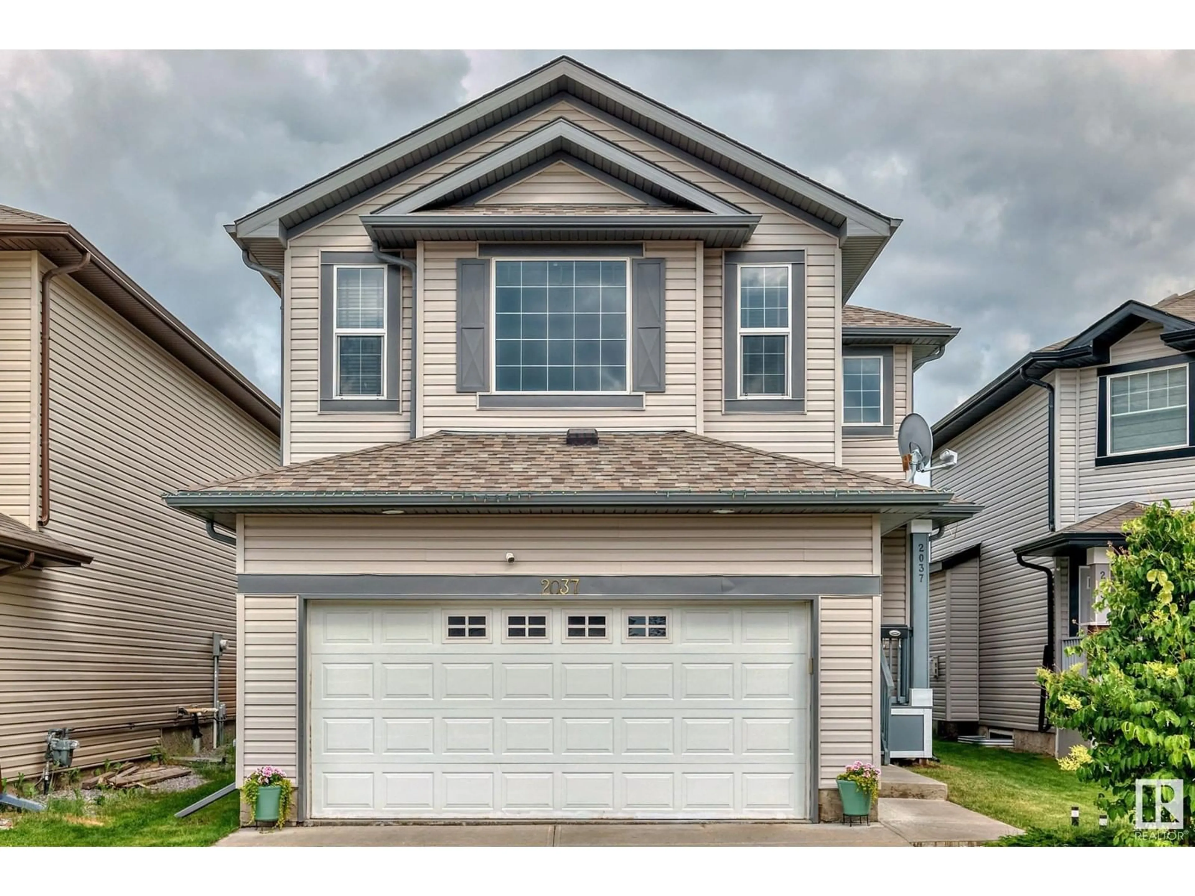 Frontside or backside of a home for 2037 33B ST NW, Edmonton Alberta T6T0L3