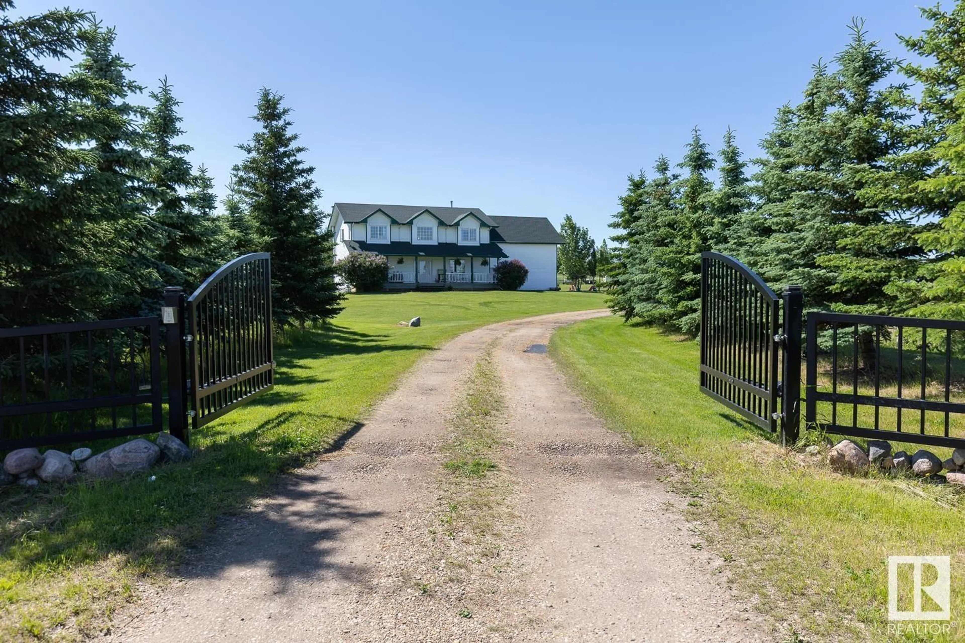 A pic from exterior of the house or condo, the fenced backyard for #3 53462 RGE RD 213, Rural Strathcona County Alberta T8G2B3