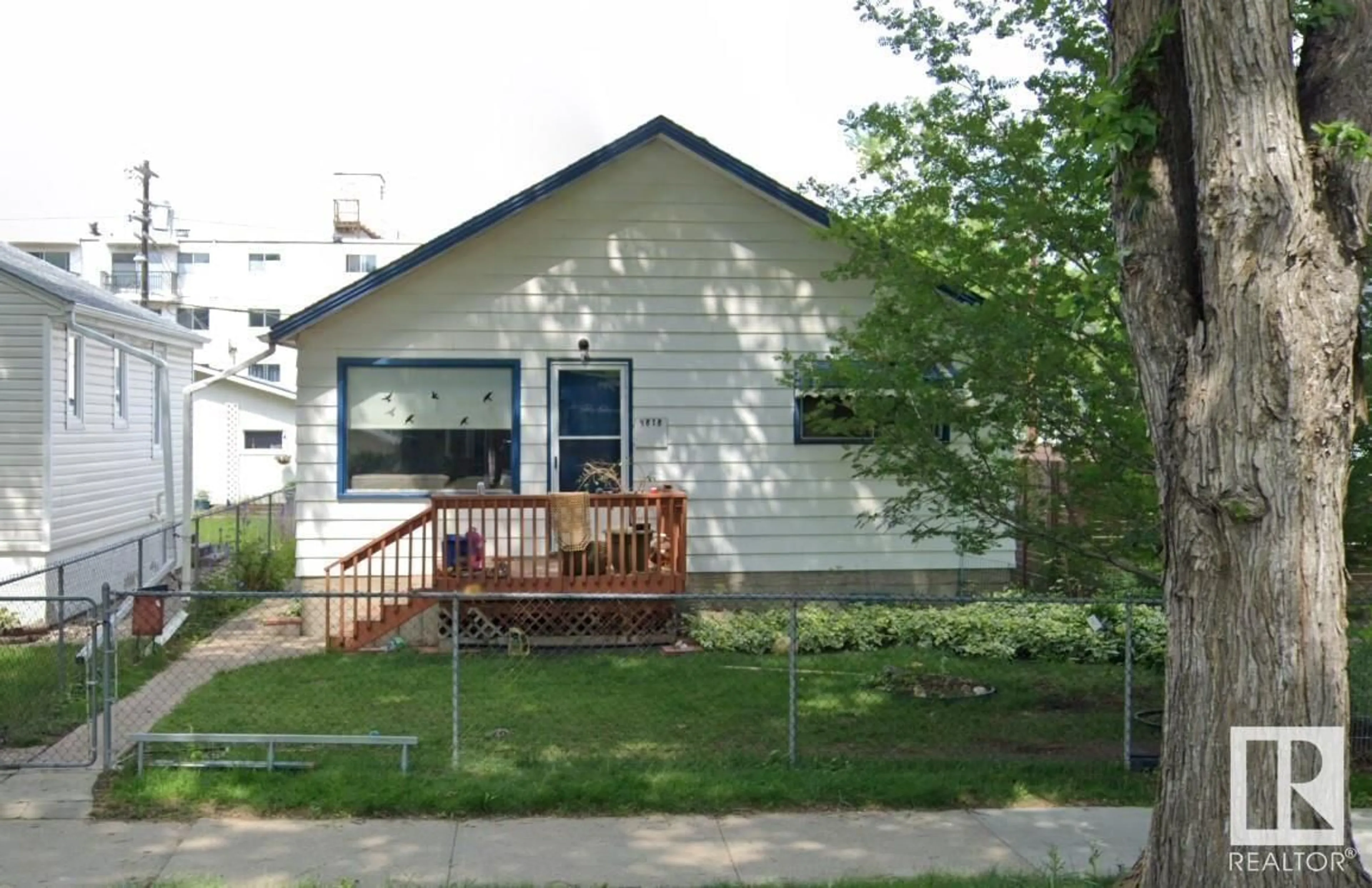 Frontside or backside of a home for 9818 81 AV NW, Edmonton Alberta T6E1W3