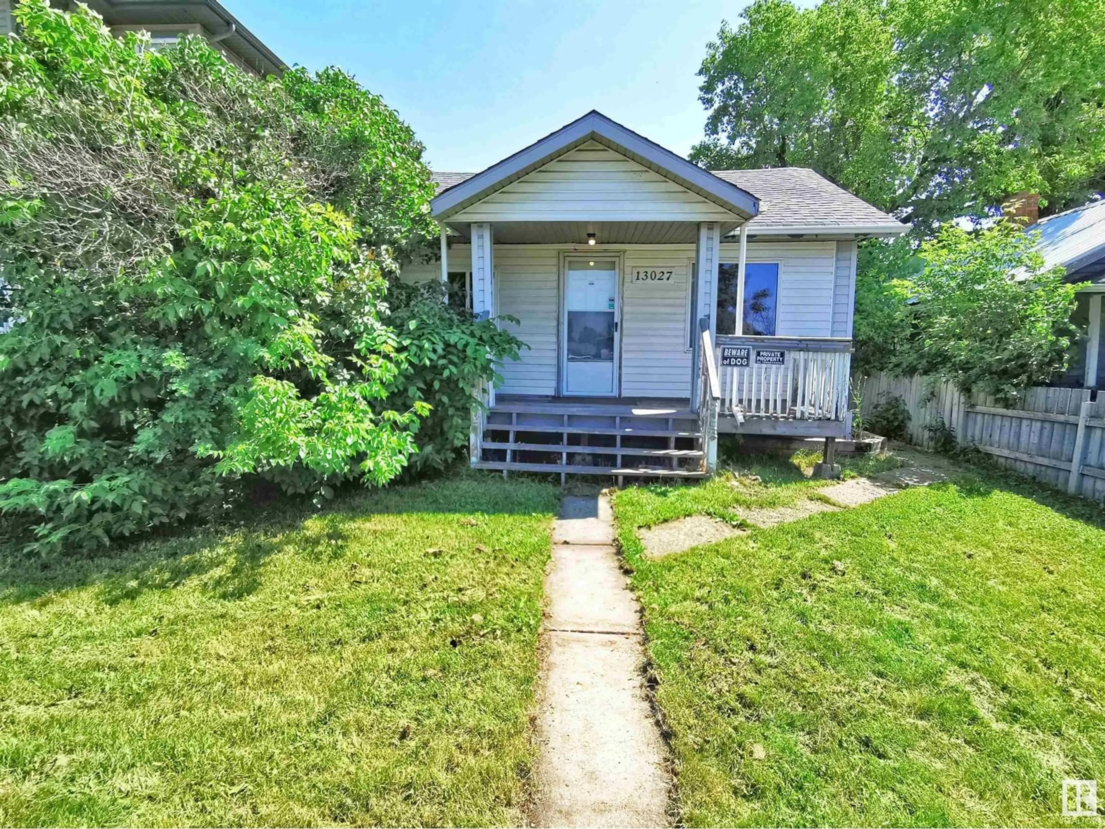 Frontside or backside of a home for 13027 66 ST NW, Edmonton Alberta T5C0A7