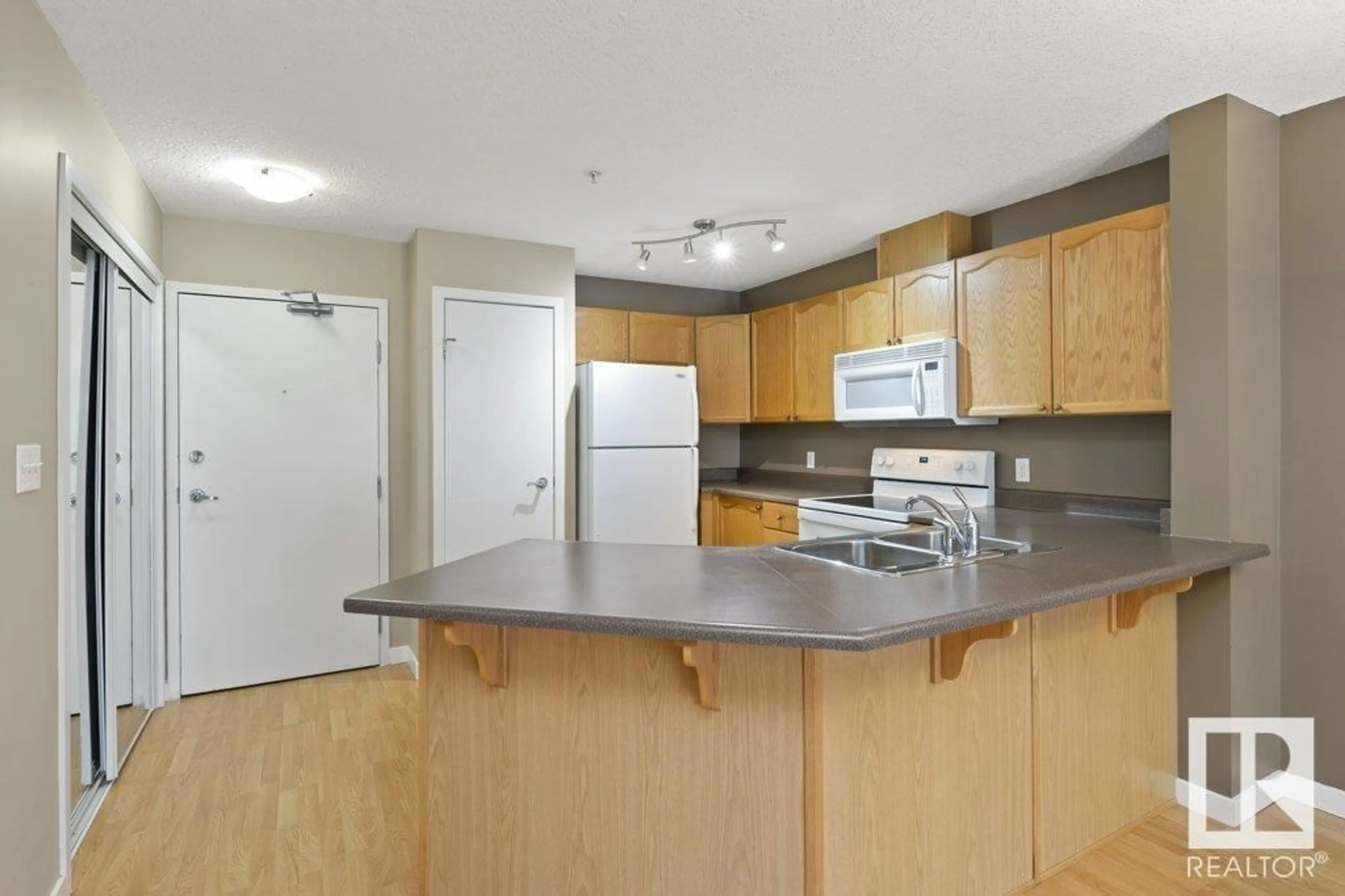 Standard kitchen for #208 4312 139 AV NW, Edmonton Alberta T5Y2Y2