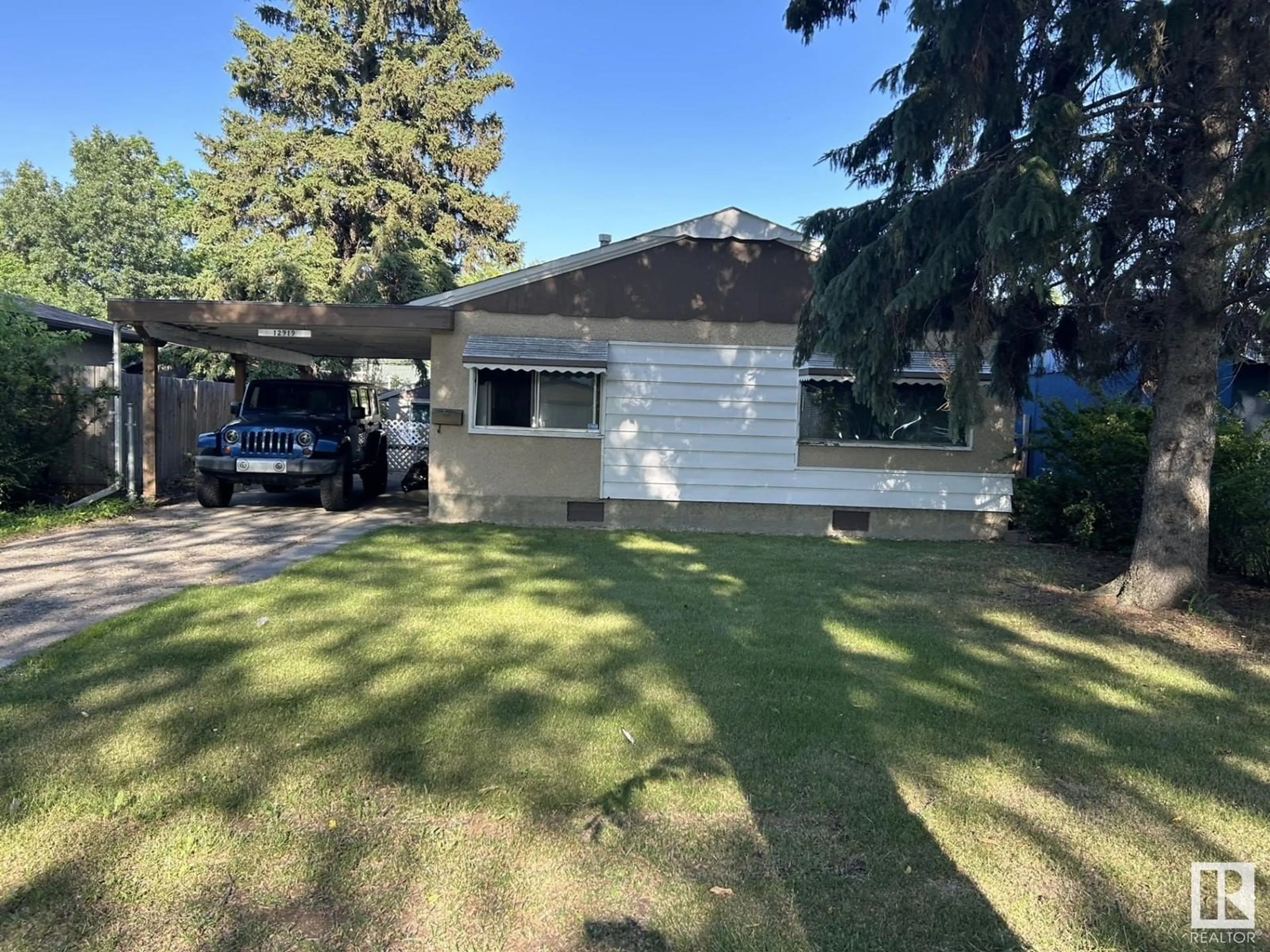 Frontside or backside of a home for 12919 116 ST NW, Edmonton Alberta T5E5H3