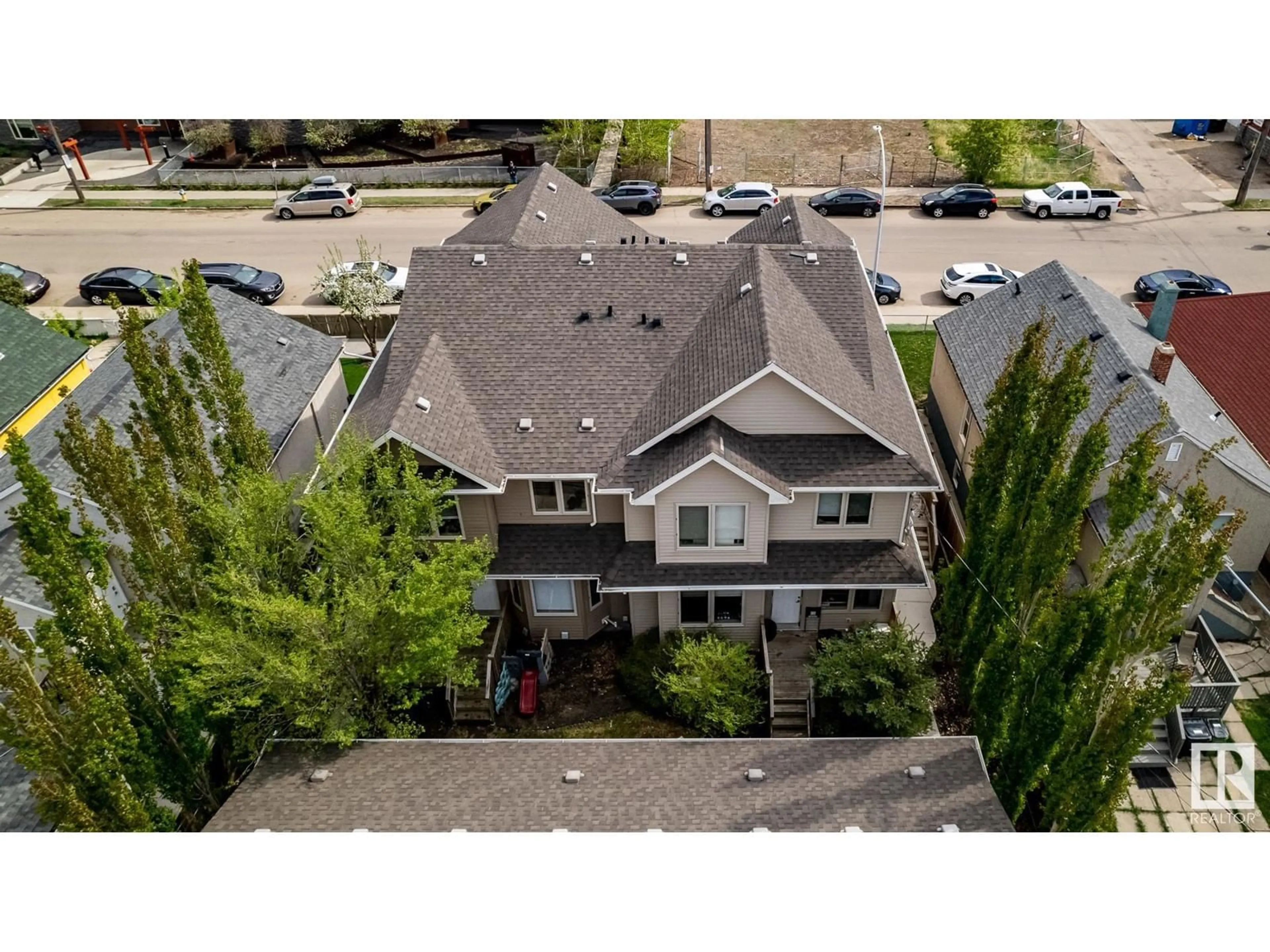 Frontside or backside of a home, the street view for 9648 106 AV NW, Edmonton Alberta T5H0N4