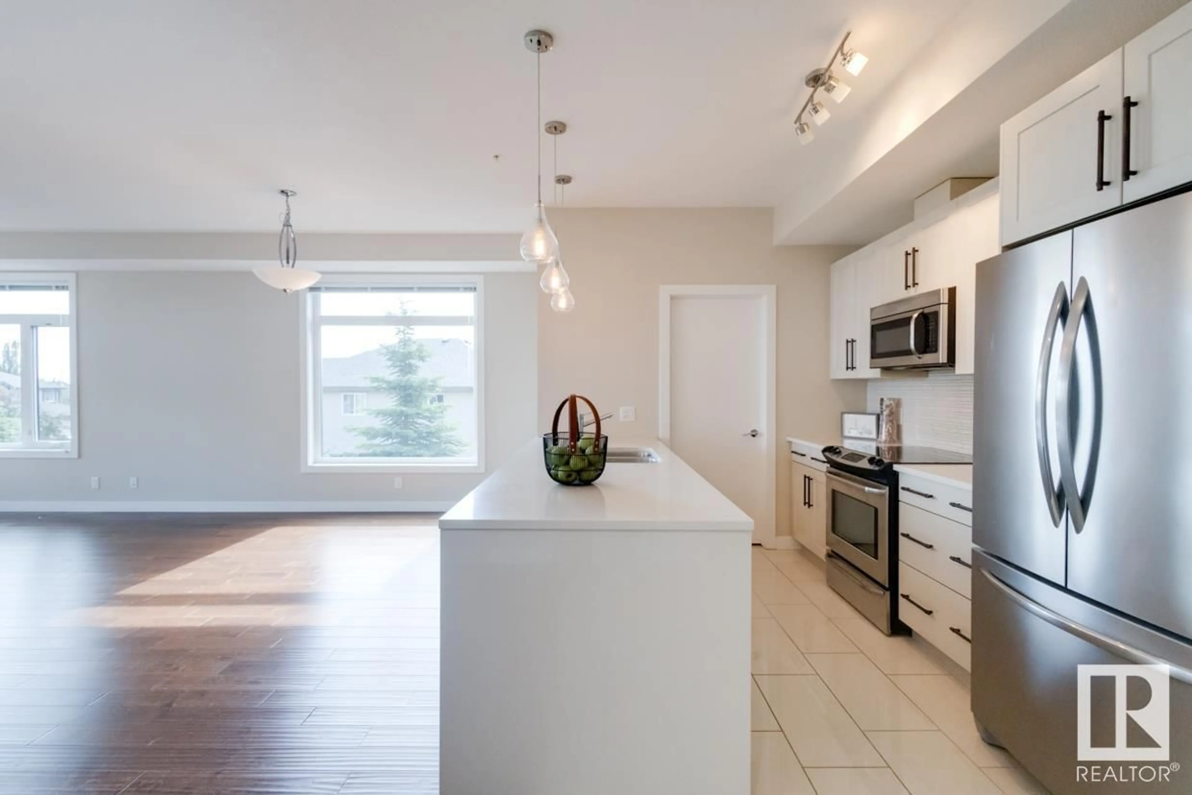 Contemporary kitchen for #212 625 LEGER WY NW, Edmonton Alberta T6R0C1