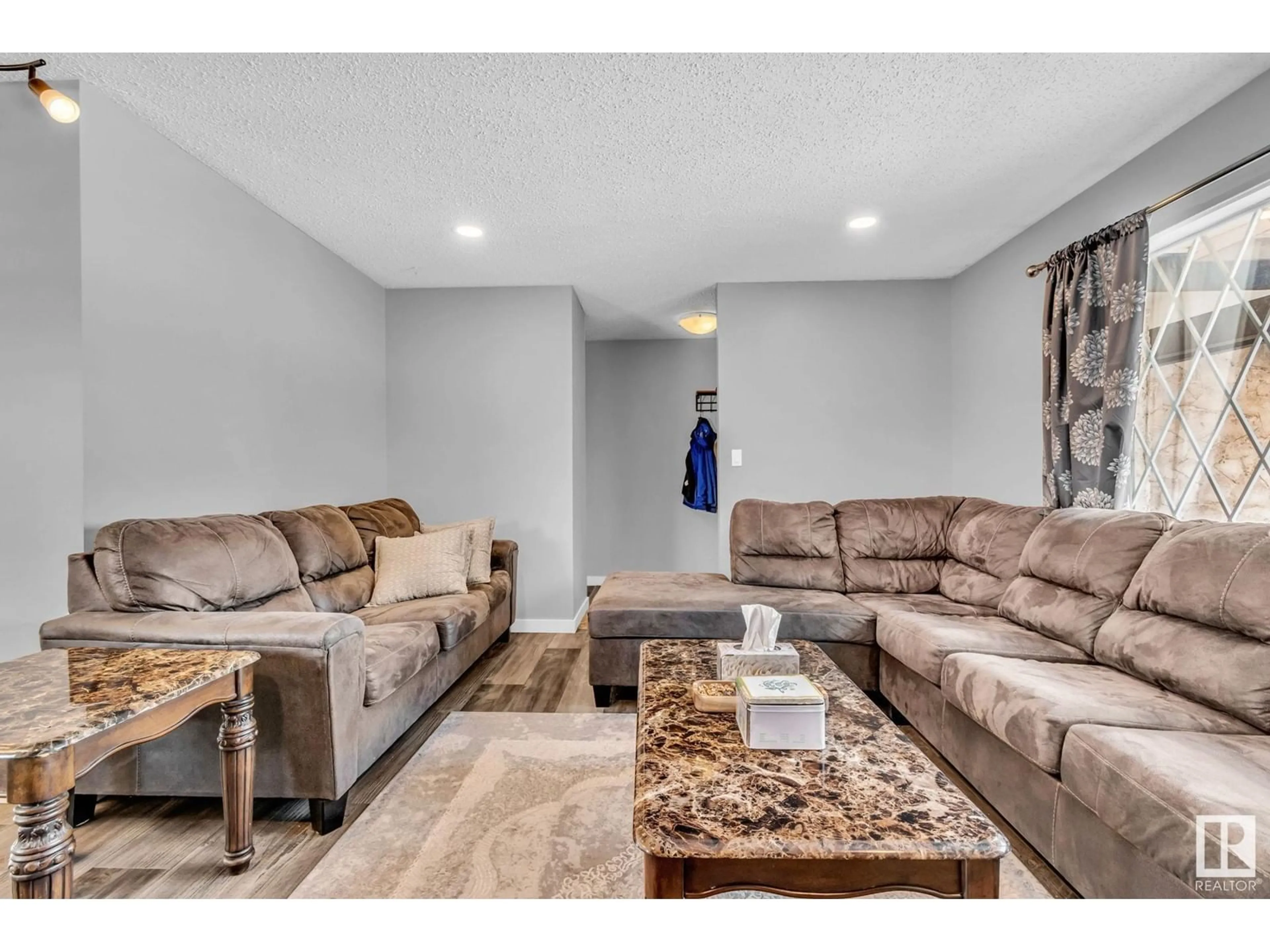 Living room for 12135 152A AV NW, Edmonton Alberta T5X1R1