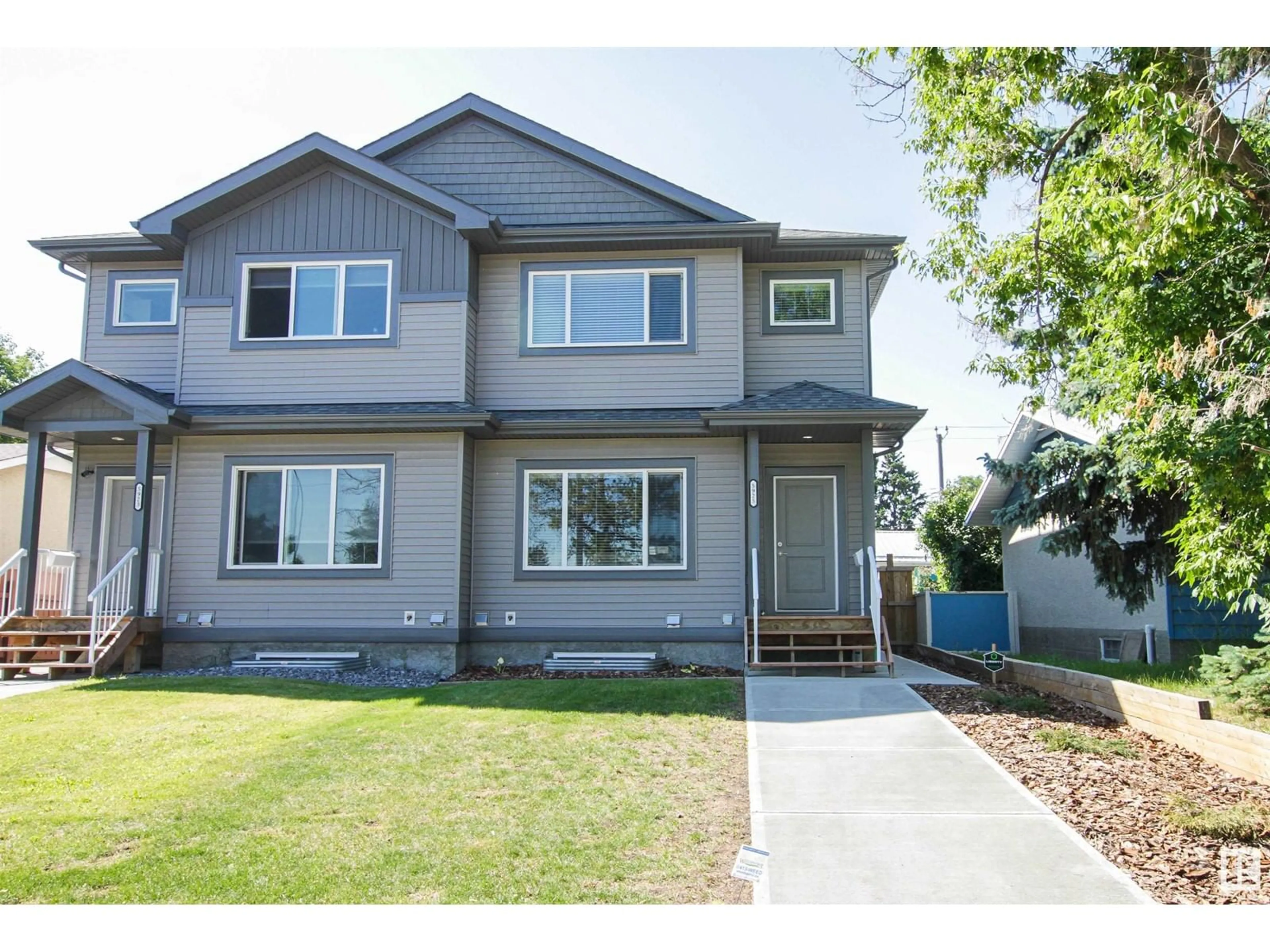 Frontside or backside of a home for 5925 137 AV NW, Edmonton Alberta T5A0P1