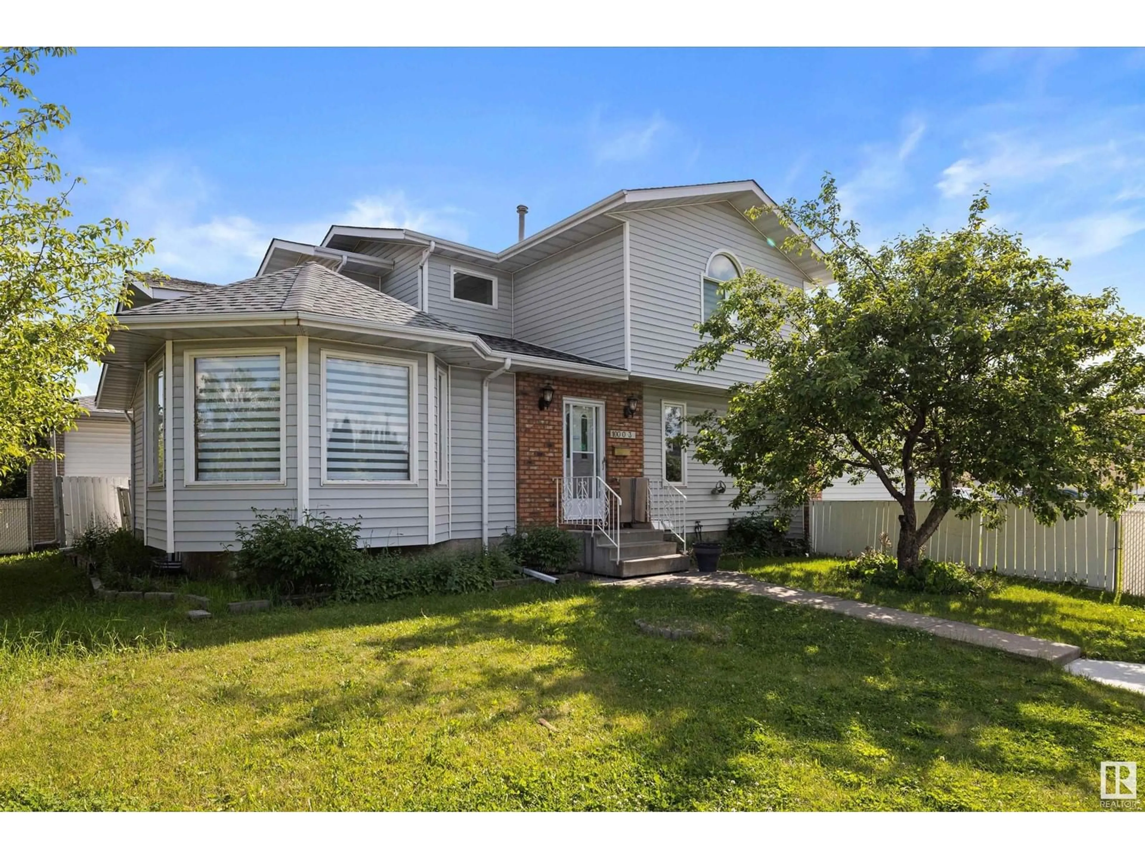 Frontside or backside of a home for 10003 161 AV NW, Edmonton Alberta T5X5V1